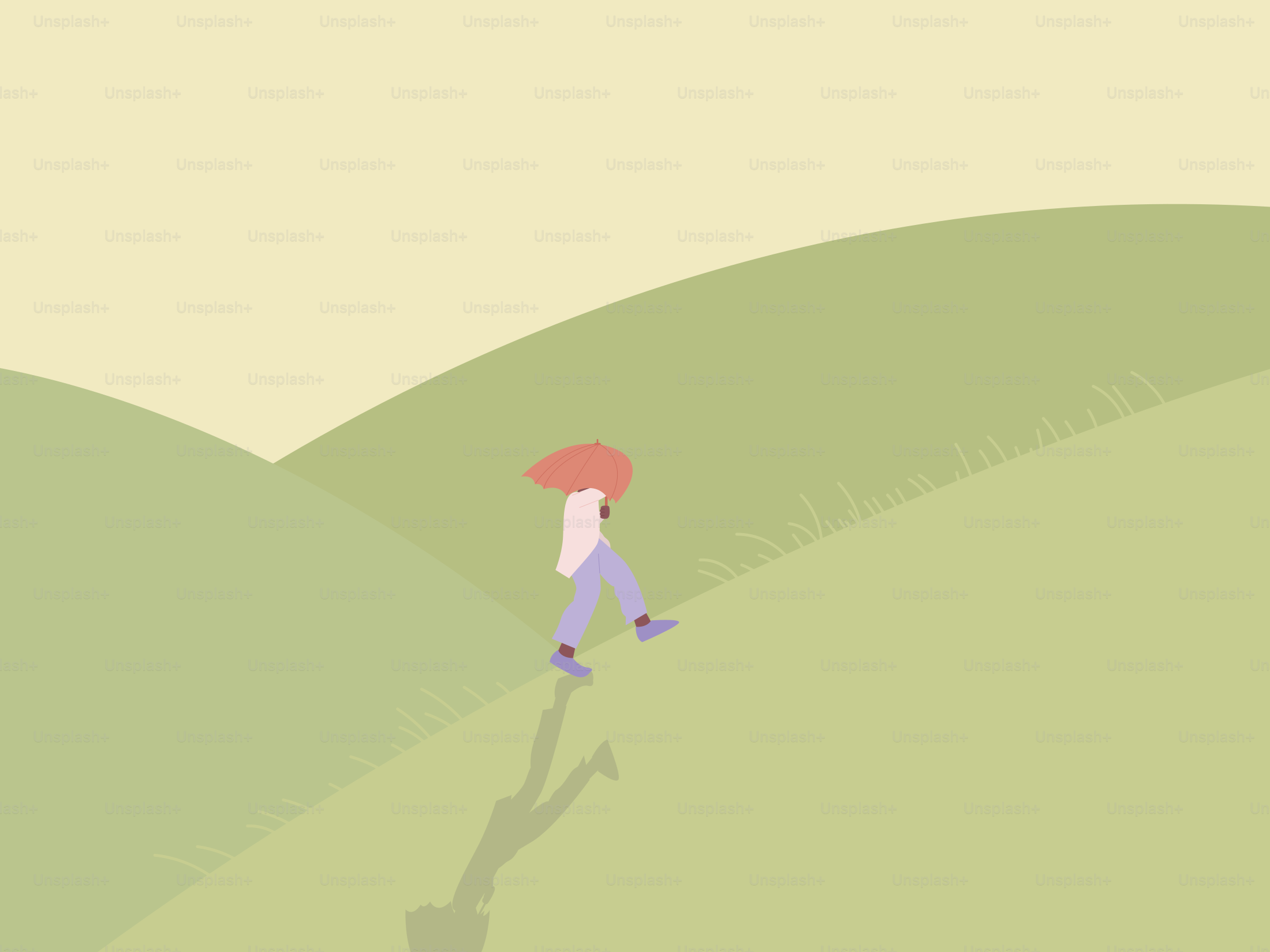 A person with an umbrella walking on a hill