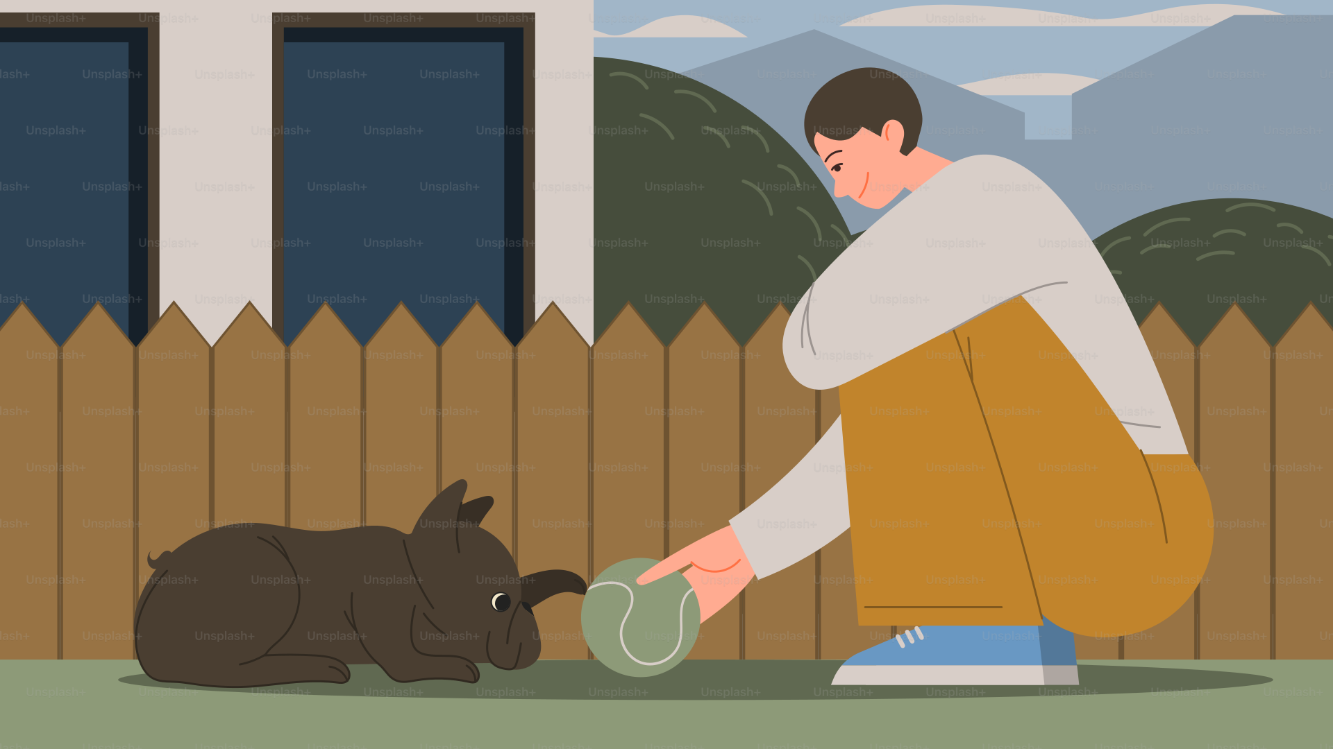 A man kneeling down next to a black dog