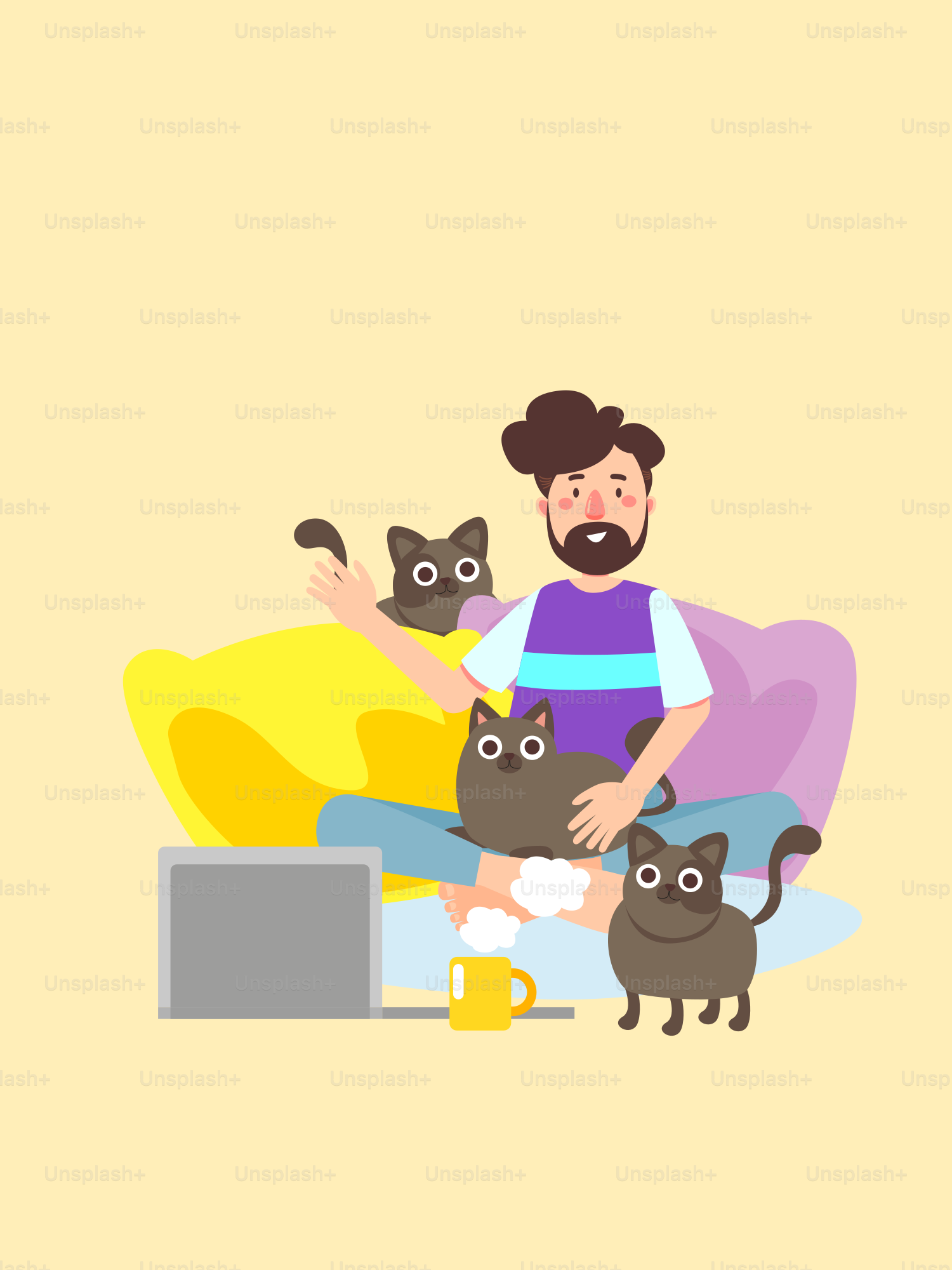 A man sitting on a couch with two cats