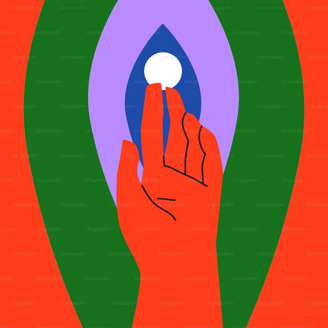 A person's hand holding a white object in front of a red background