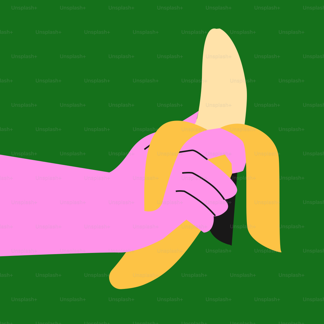 A pink hand holding a banana on a green background