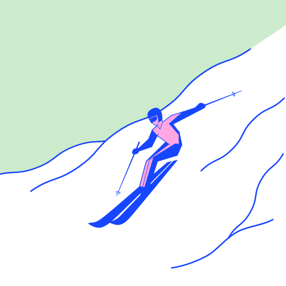 A skier is skiing down a snowy hill