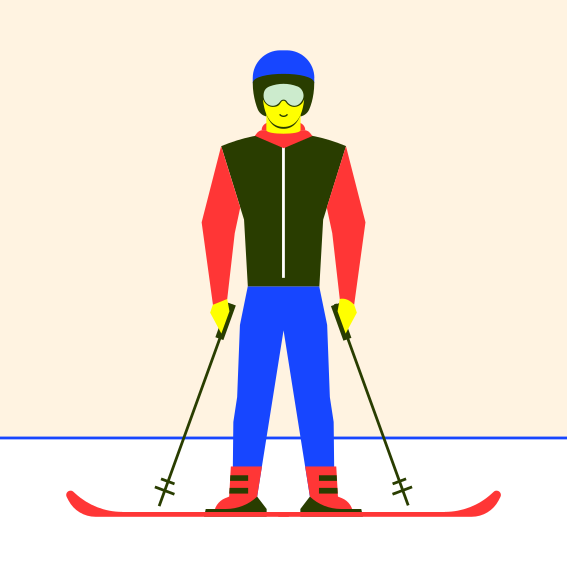 A man riding skis on top of a snow covered ground