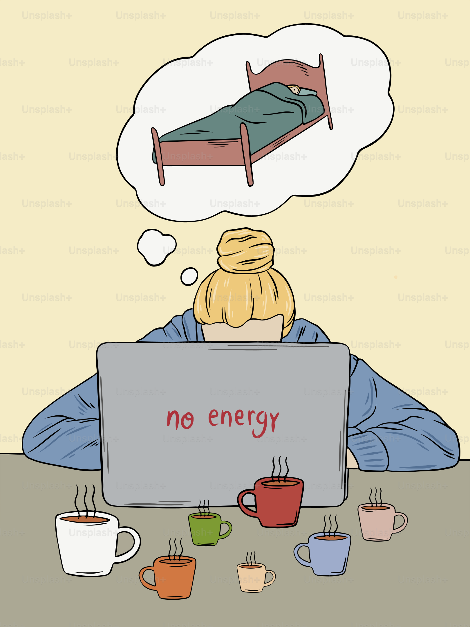 A person sitting at a table with a laptop in front of them