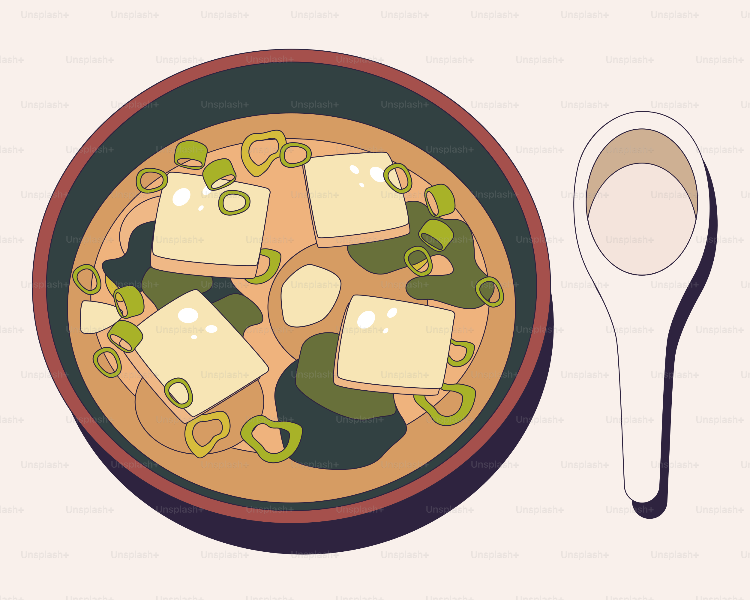 A bowl of soup with a spoon and a spoon next to it