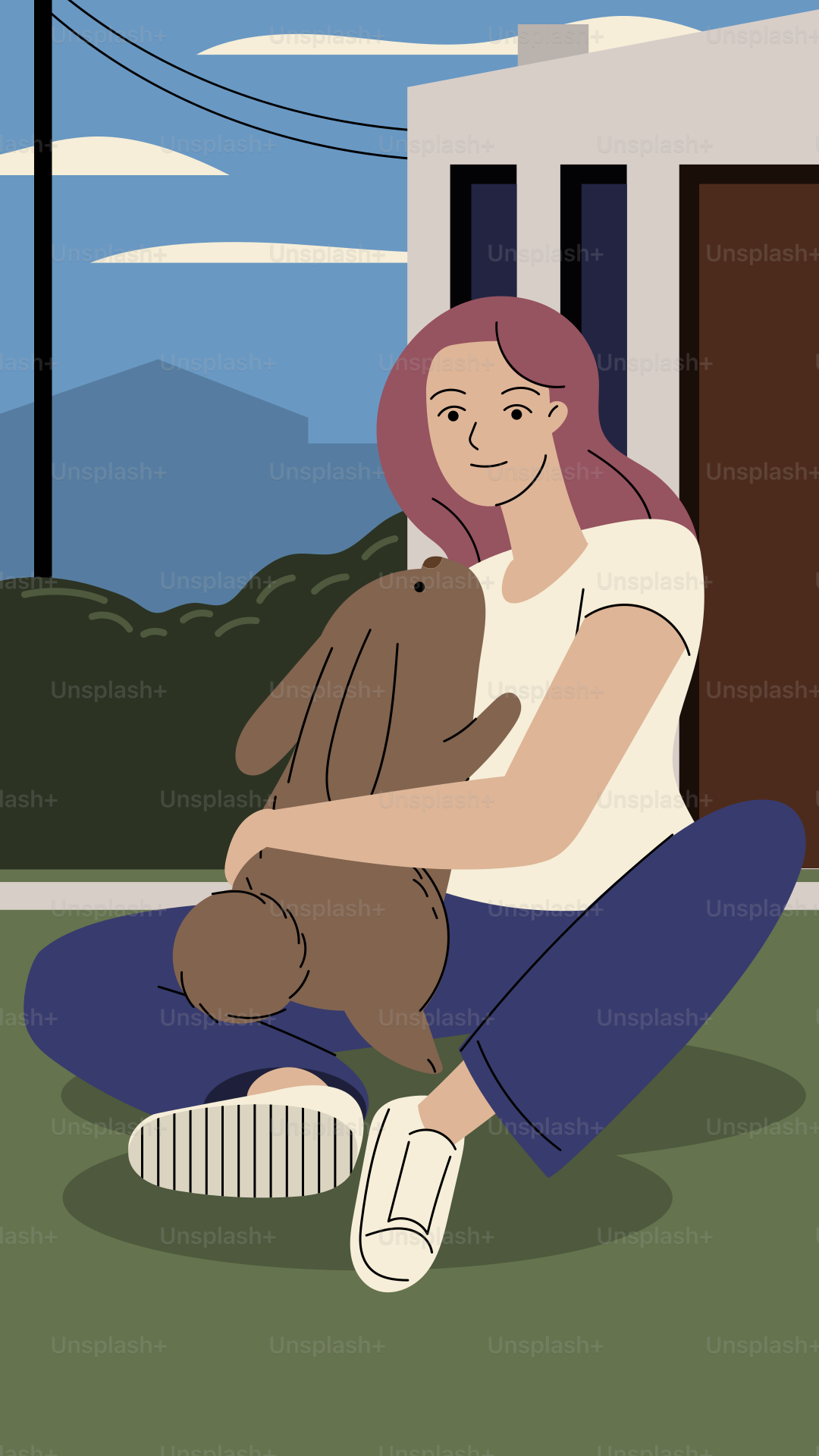 A woman sitting on the ground holding a teddy bear