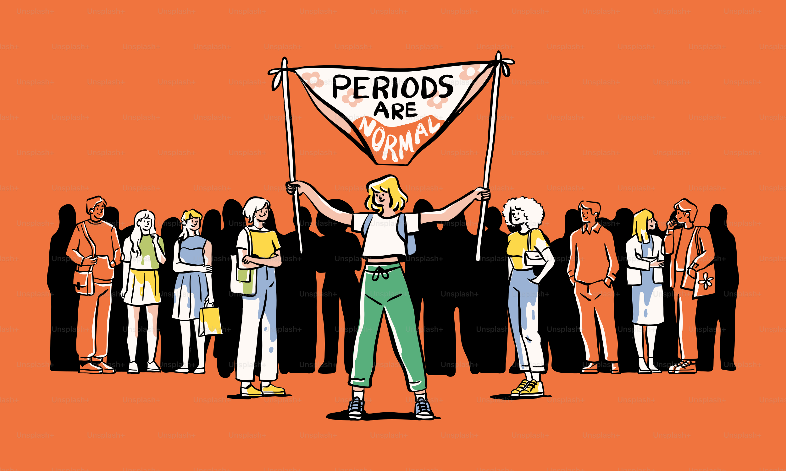 A man holding a sign with a group of people behind him