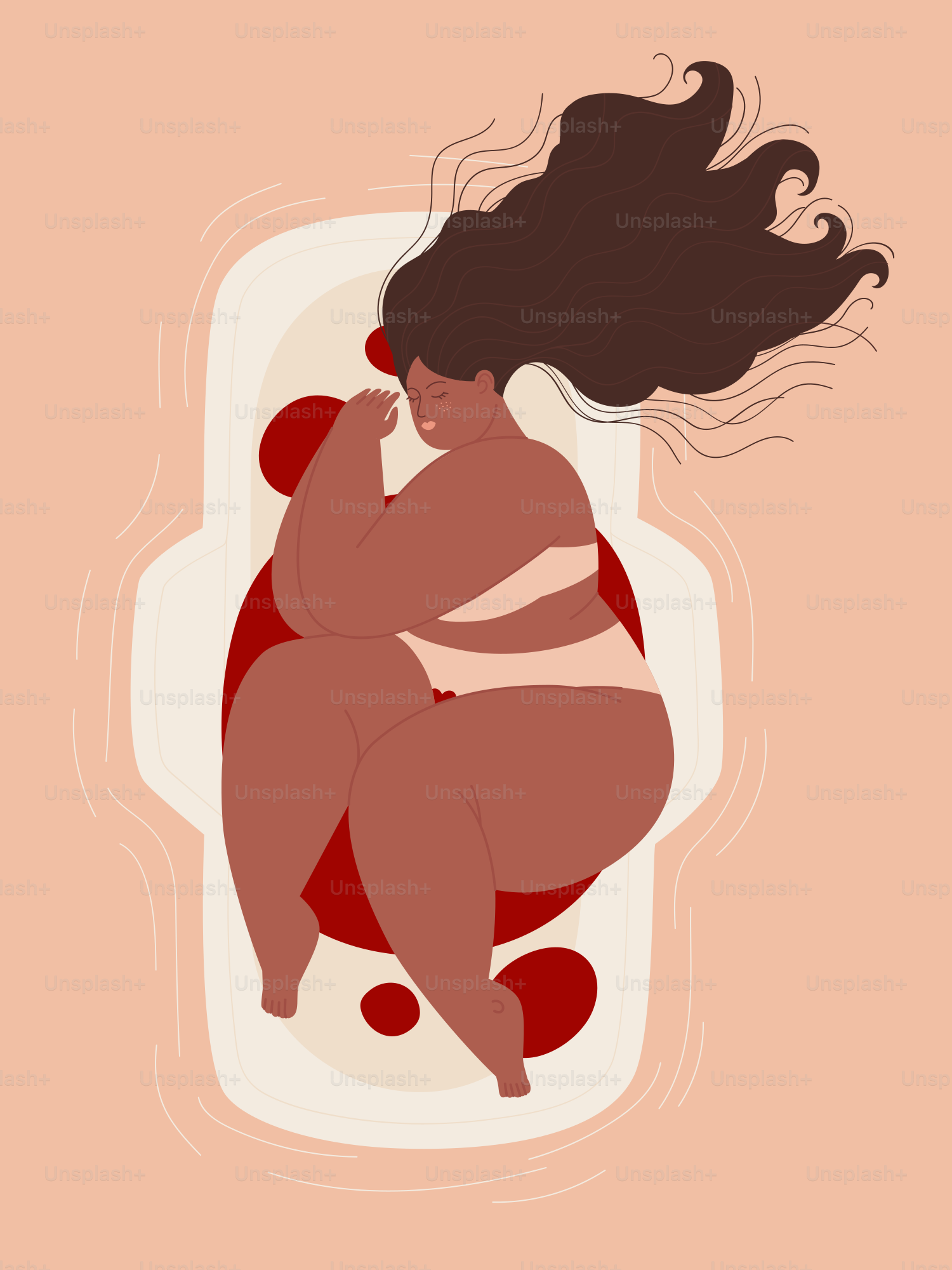 A woman sitting on a pillow with her hair blowing in the wind