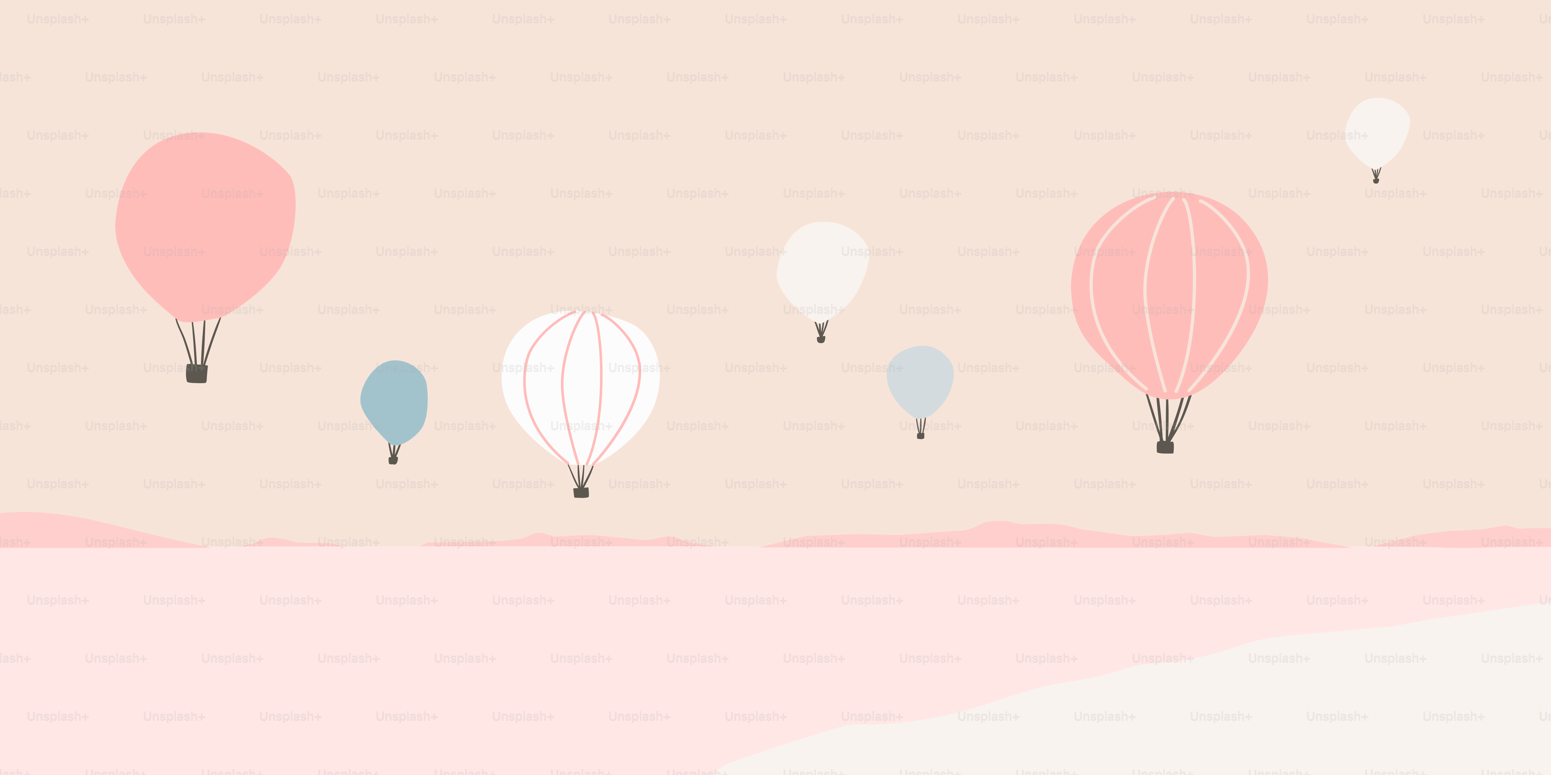 A group of hot air balloons flying in the sky