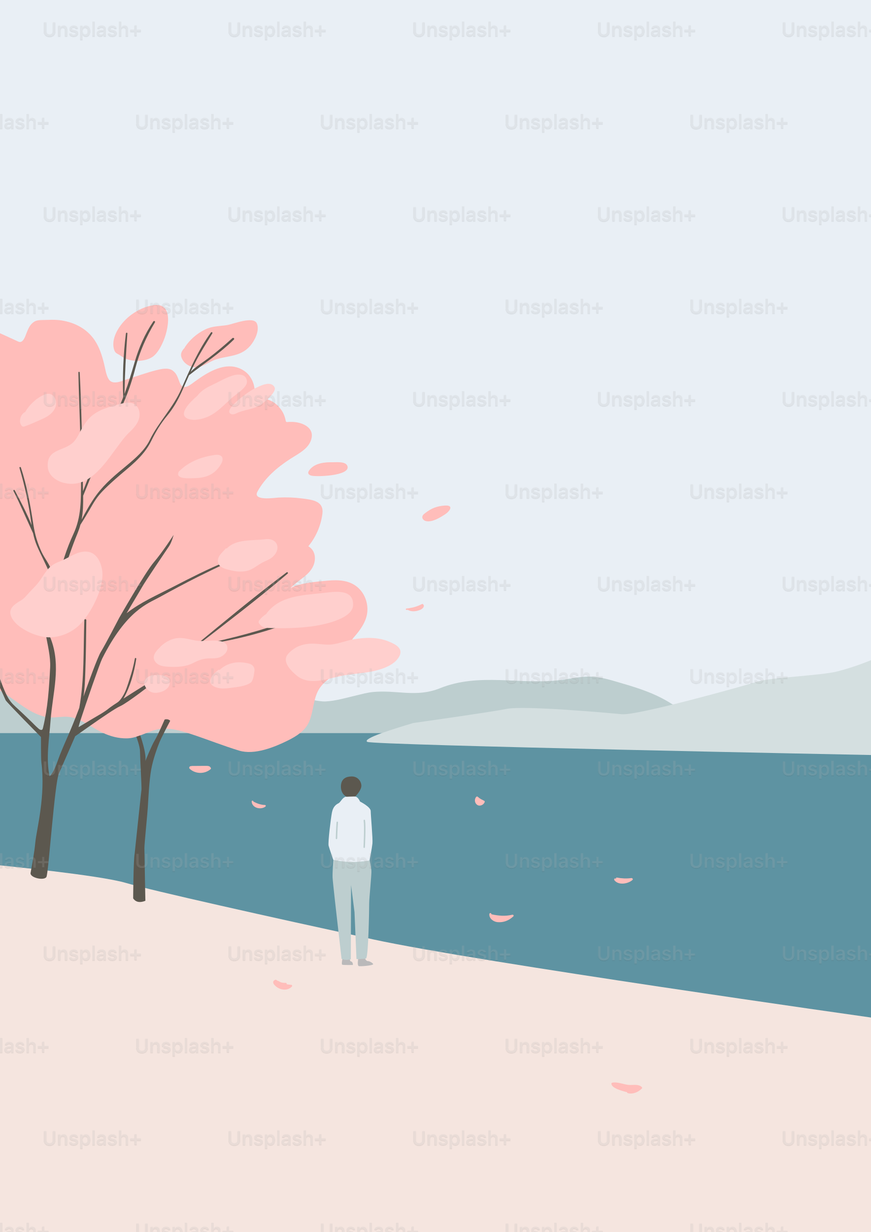 A man standing on a beach next to a tree