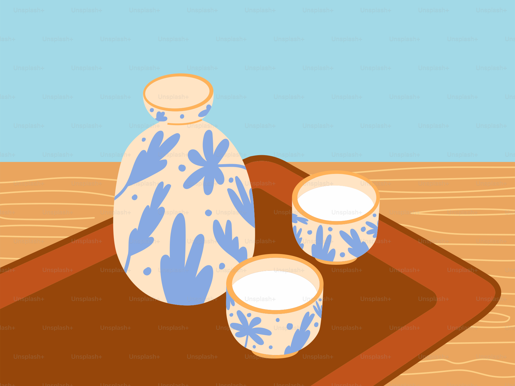 A blue and white vase sitting on top of a wooden table