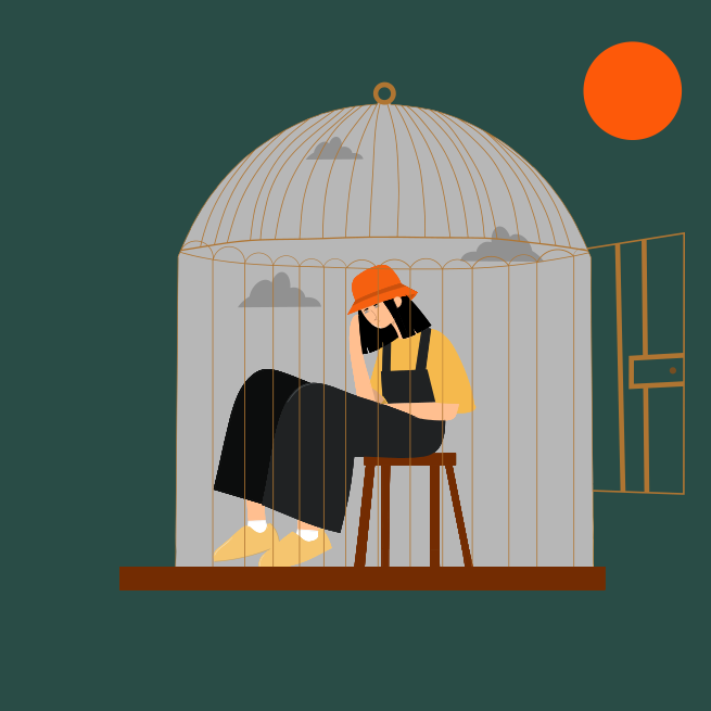 A woman sitting on a stool in a birdcage