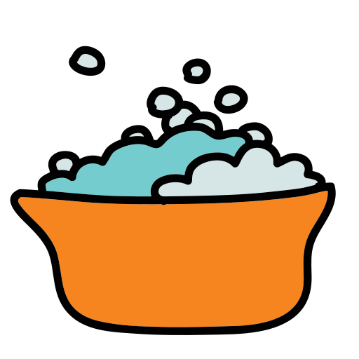 An orange bowl filled with foam and bubbles