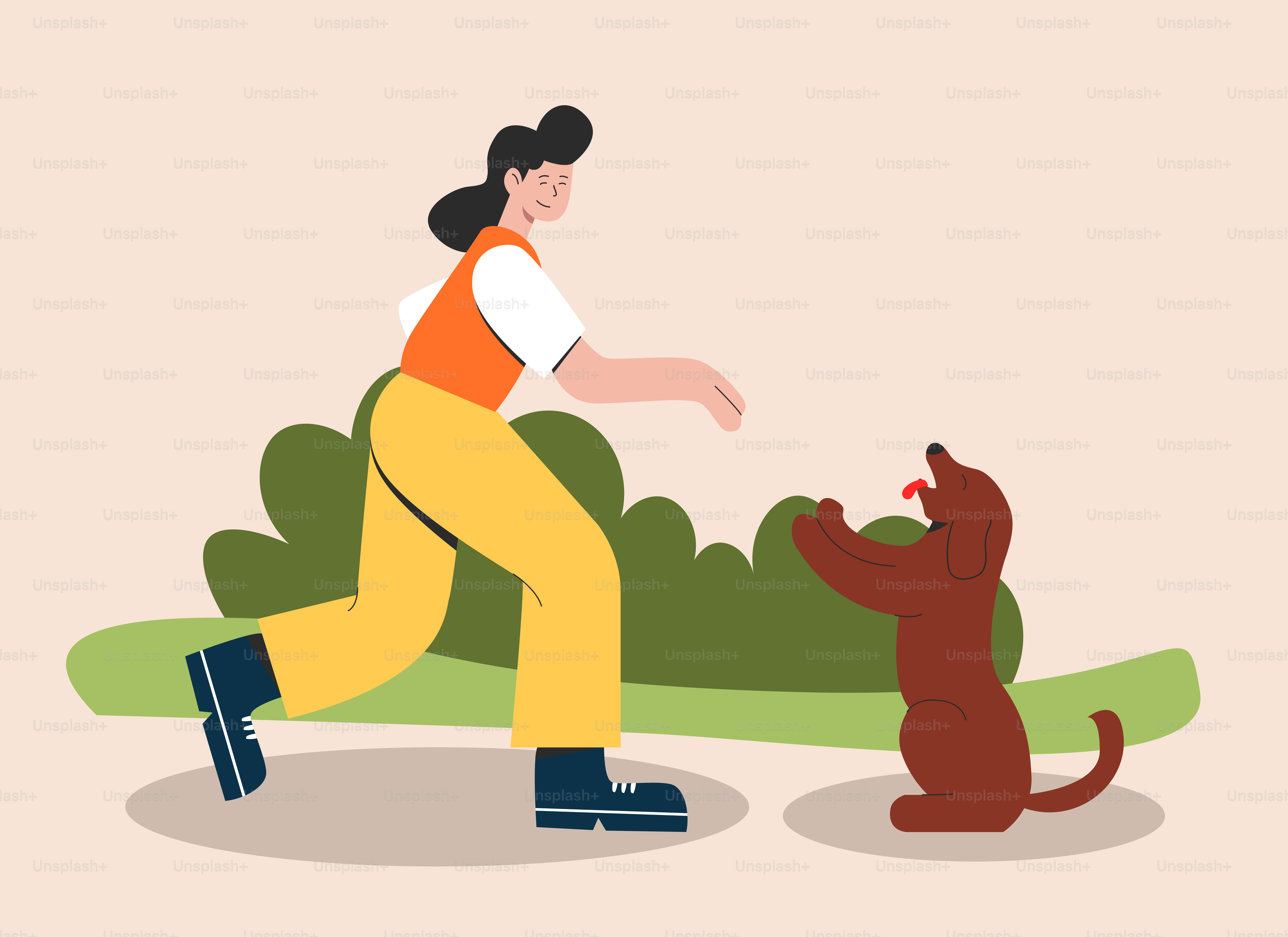 A woman is playing with a dog in the park
