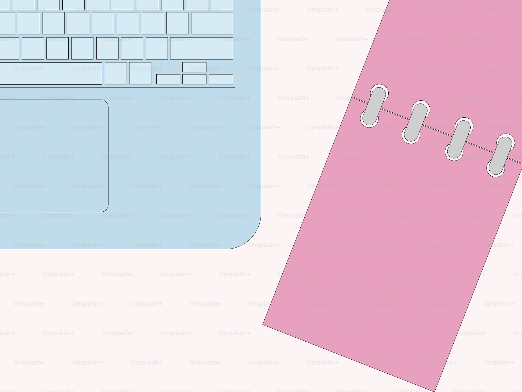 A laptop computer sitting next to a pink notebook