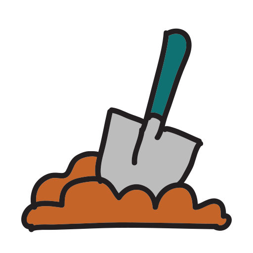 A shovel stuck in a pile of dirt