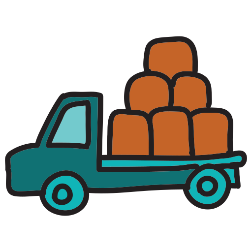 A truck with a load of hay on the back