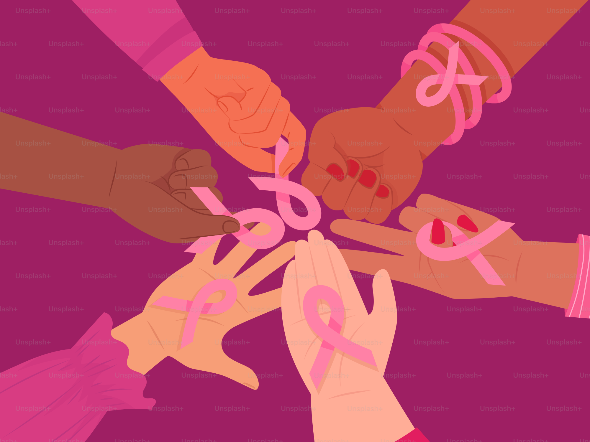 A group of people putting pink ribbon on each other