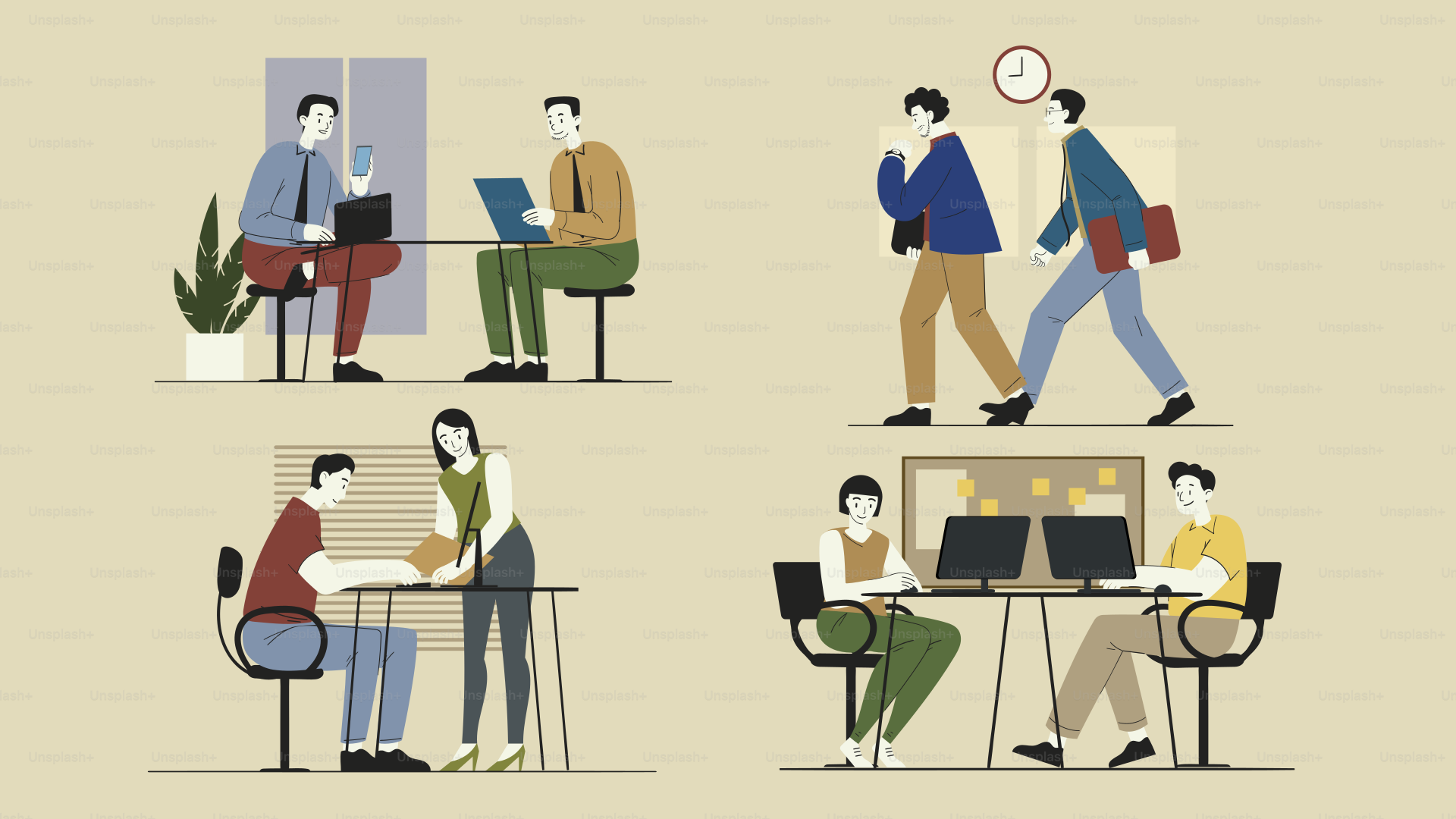 A group of people sitting at a table working on laptops