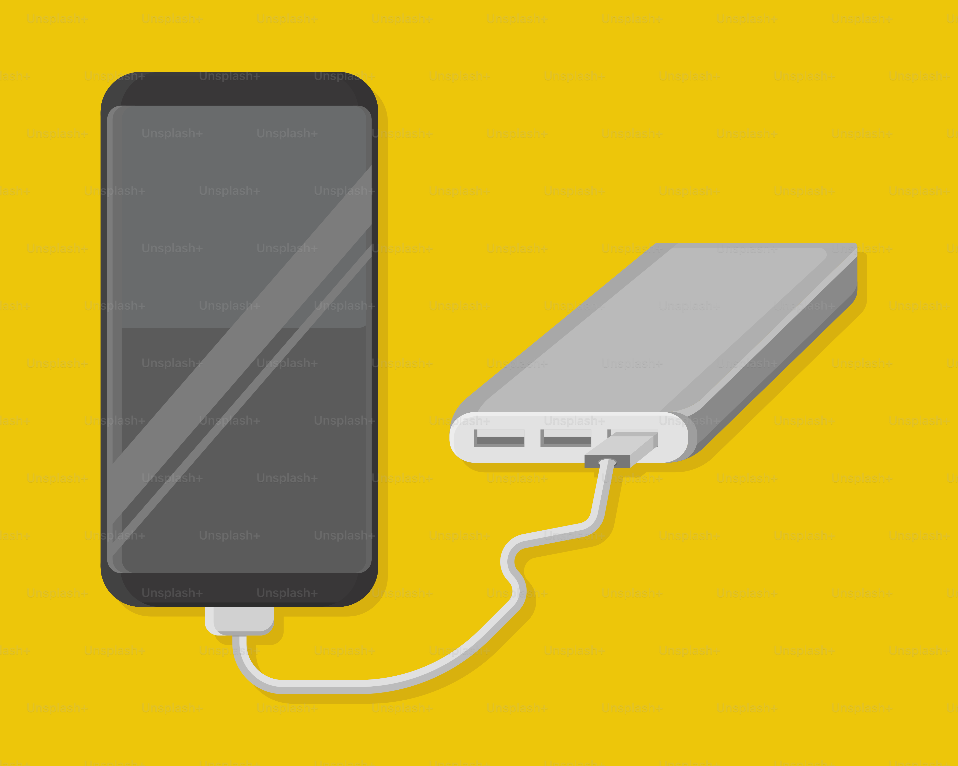 노란색 배경에 충전기에 연결된 휴대전화