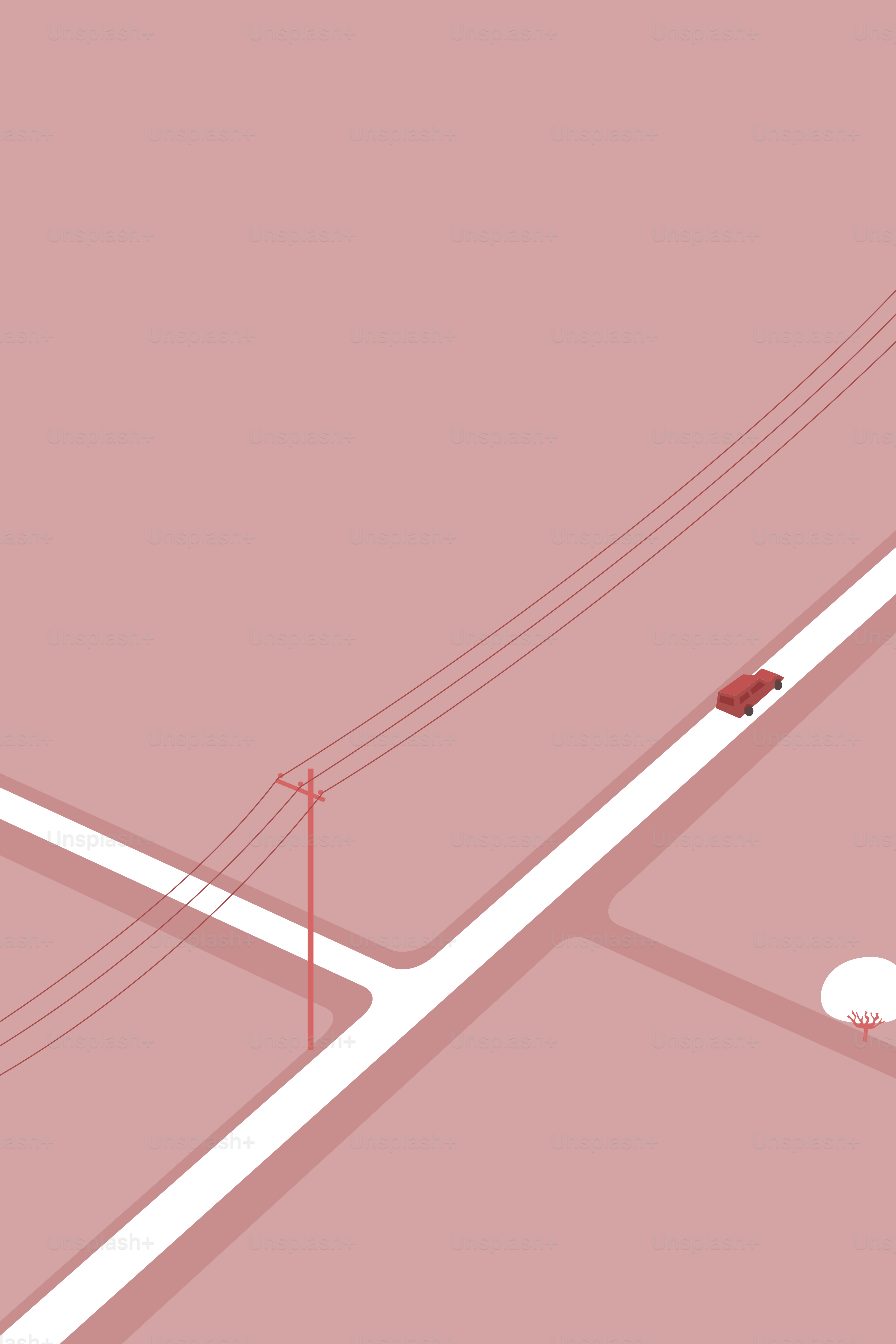 An aerial view of a street intersection with a red car