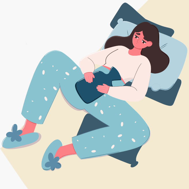 A woman laying on a bed with her legs crossed