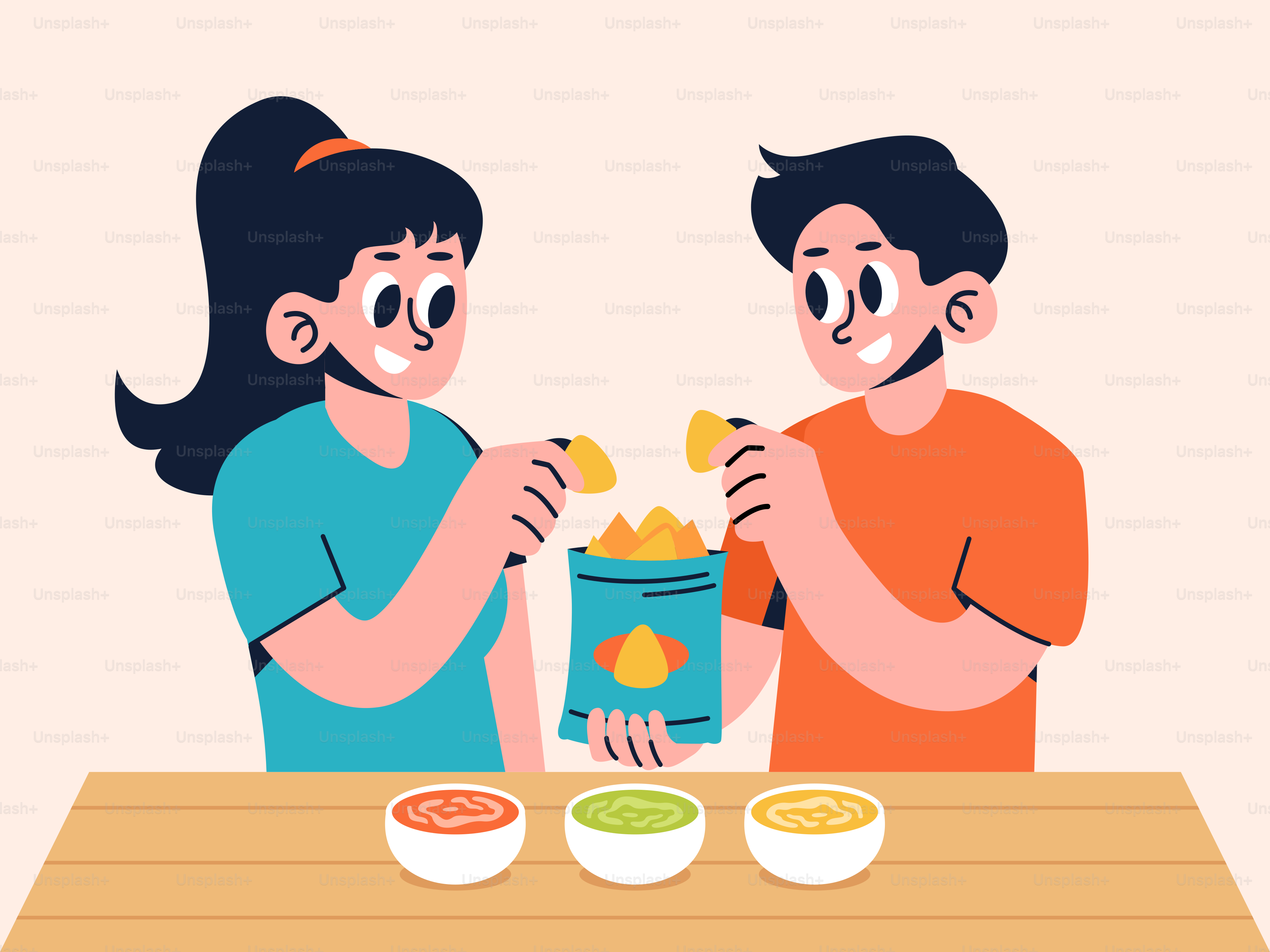 A man and a woman sitting at a table eating food