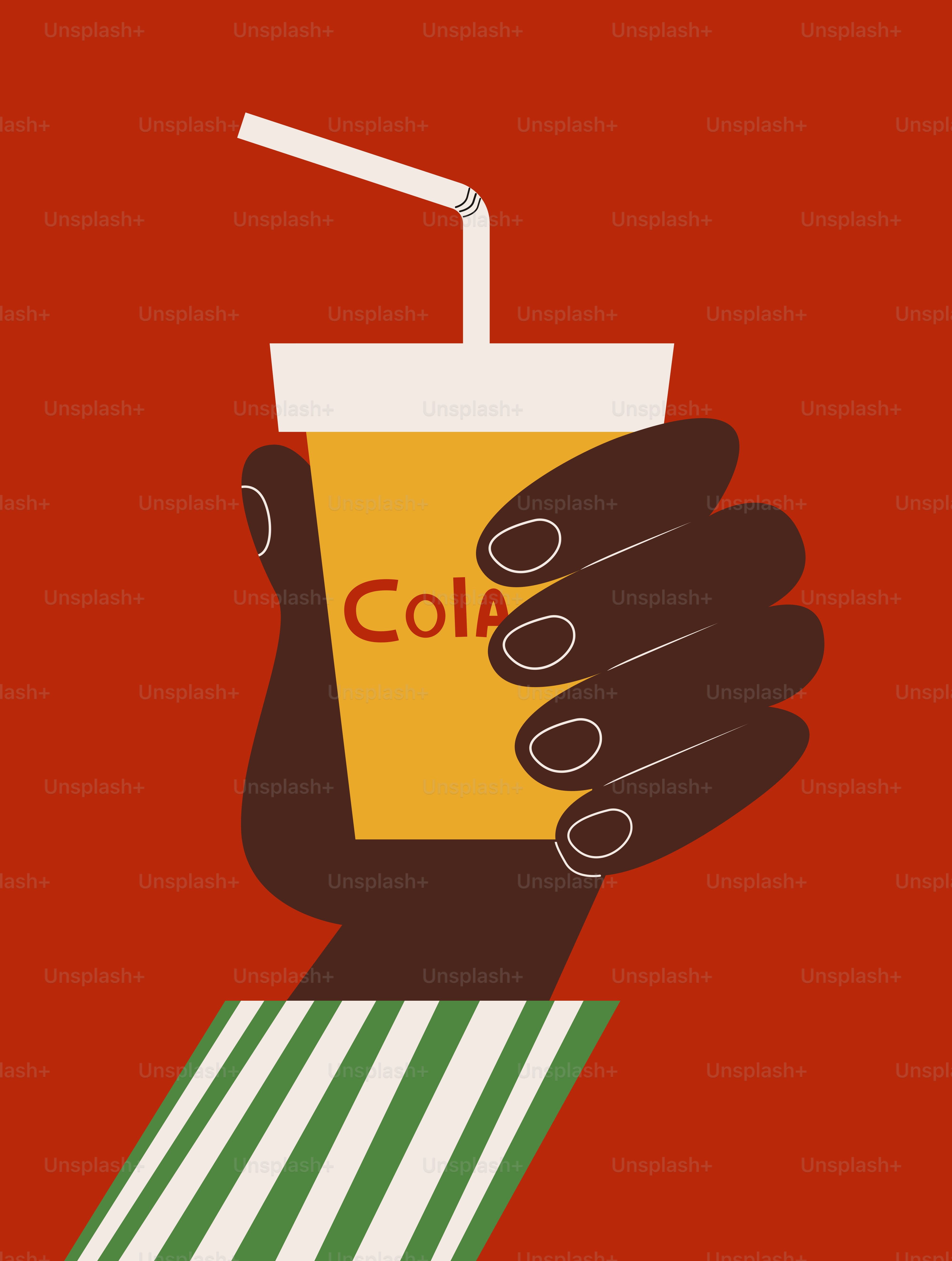 A hand holding a cup with a straw in it