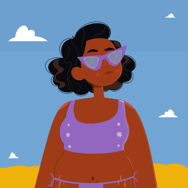 A woman in a bathing suit standing on a beach