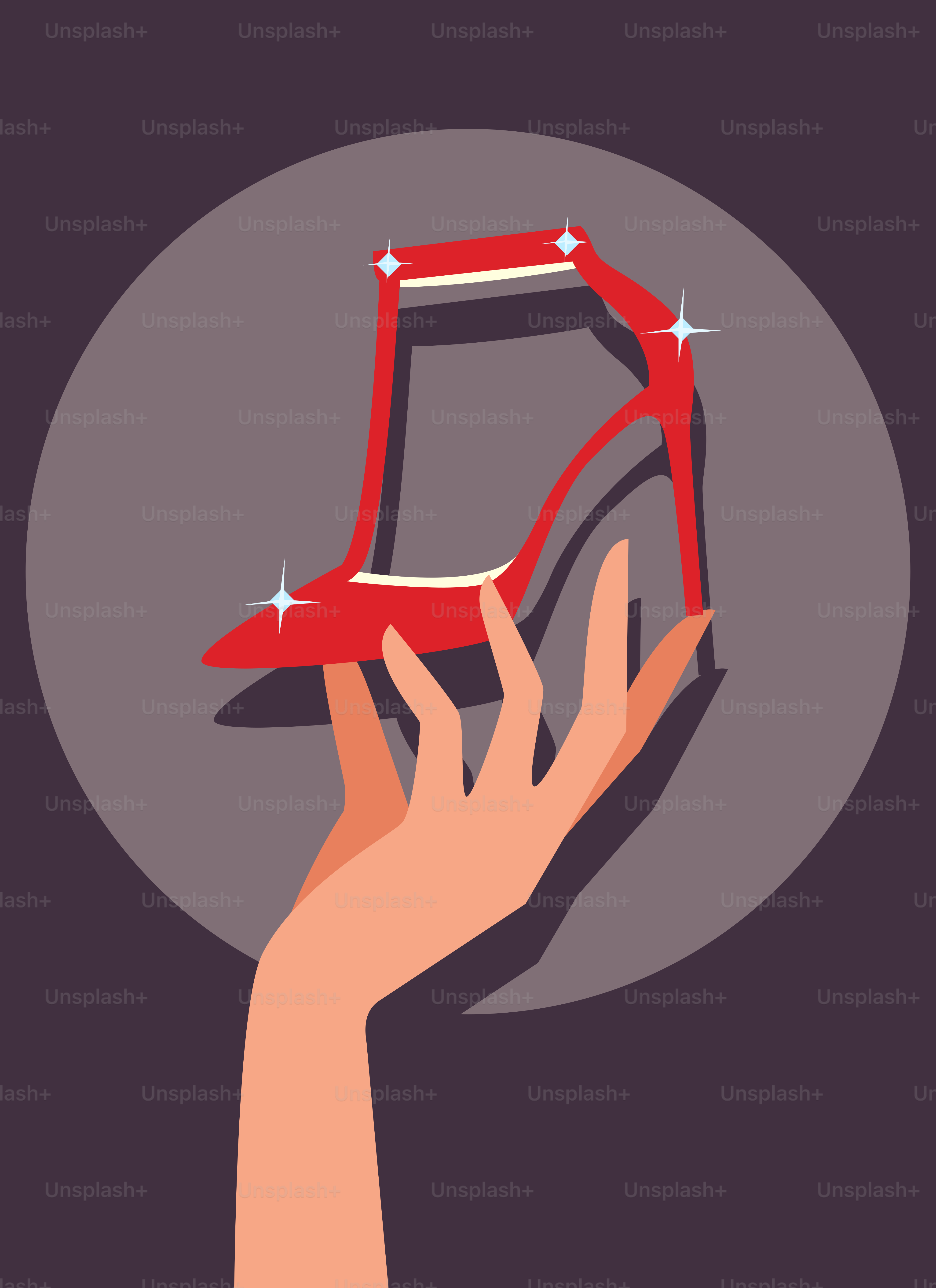 A woman's hand holding a red high heel shoe