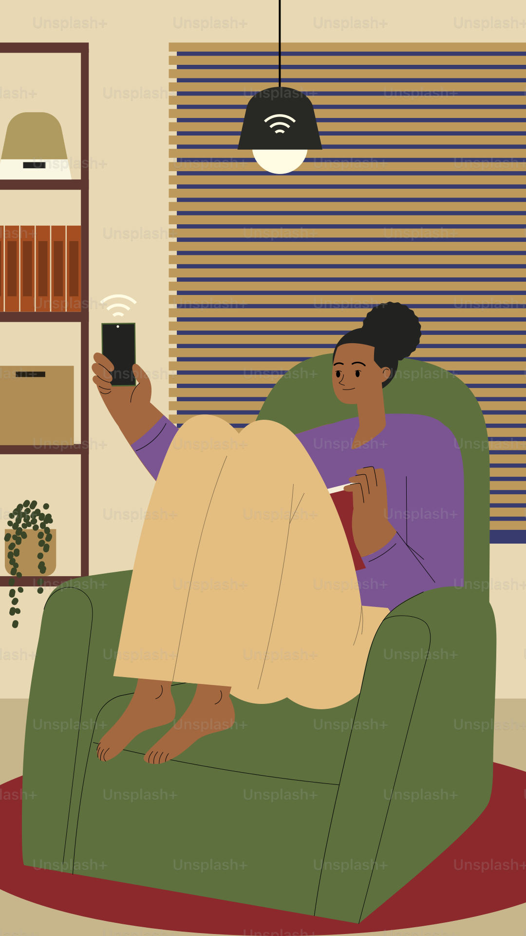 A woman sitting in a chair holding a cell phone