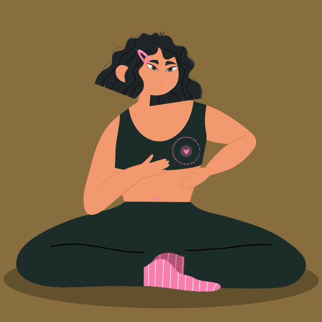 A woman sitting on the floor with a camera