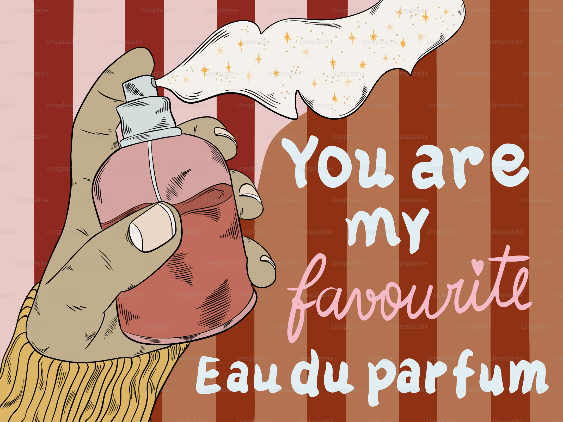 香水の瓶を持つ手の写真