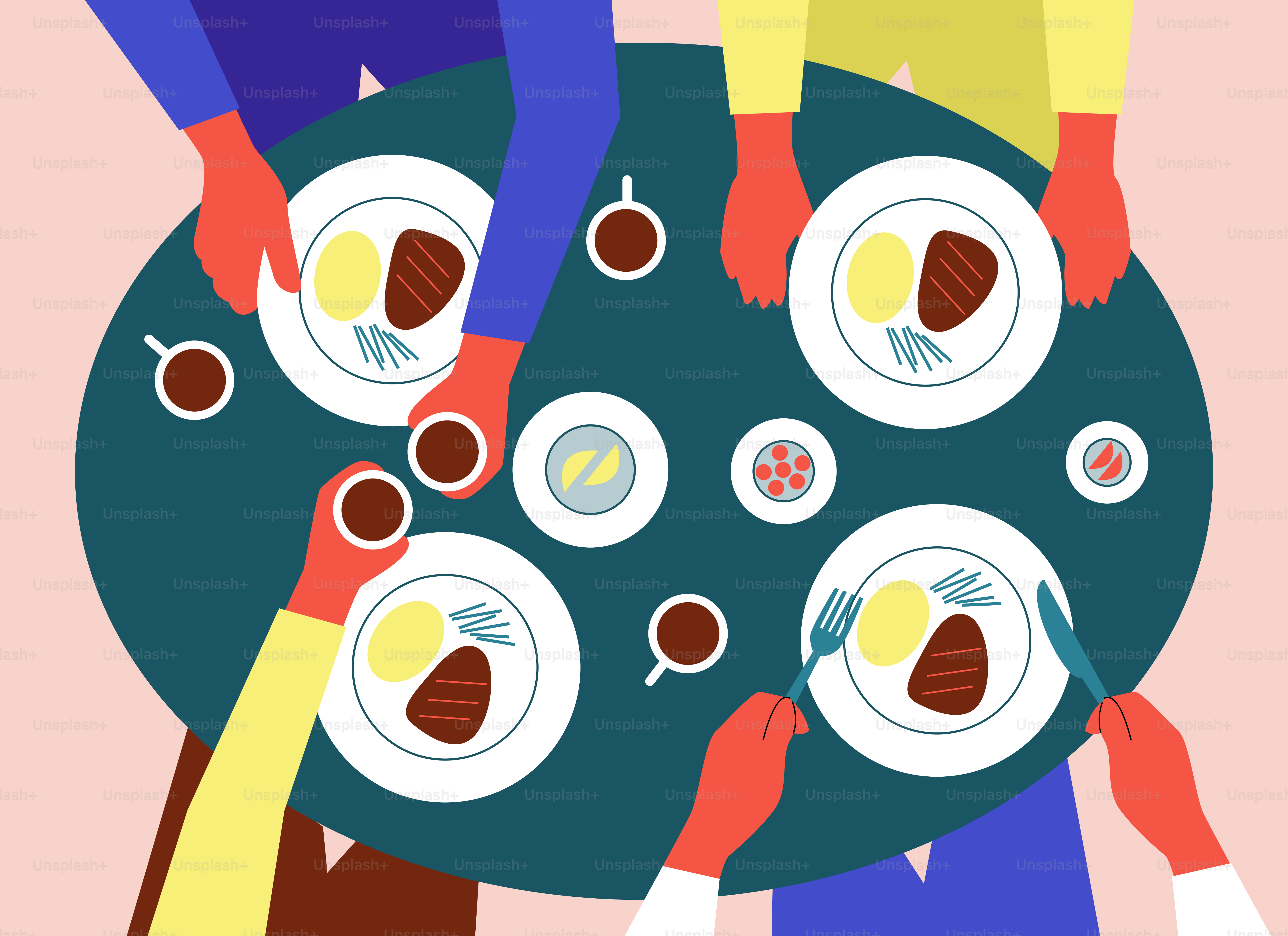 A group of people sitting at a table with plates of food