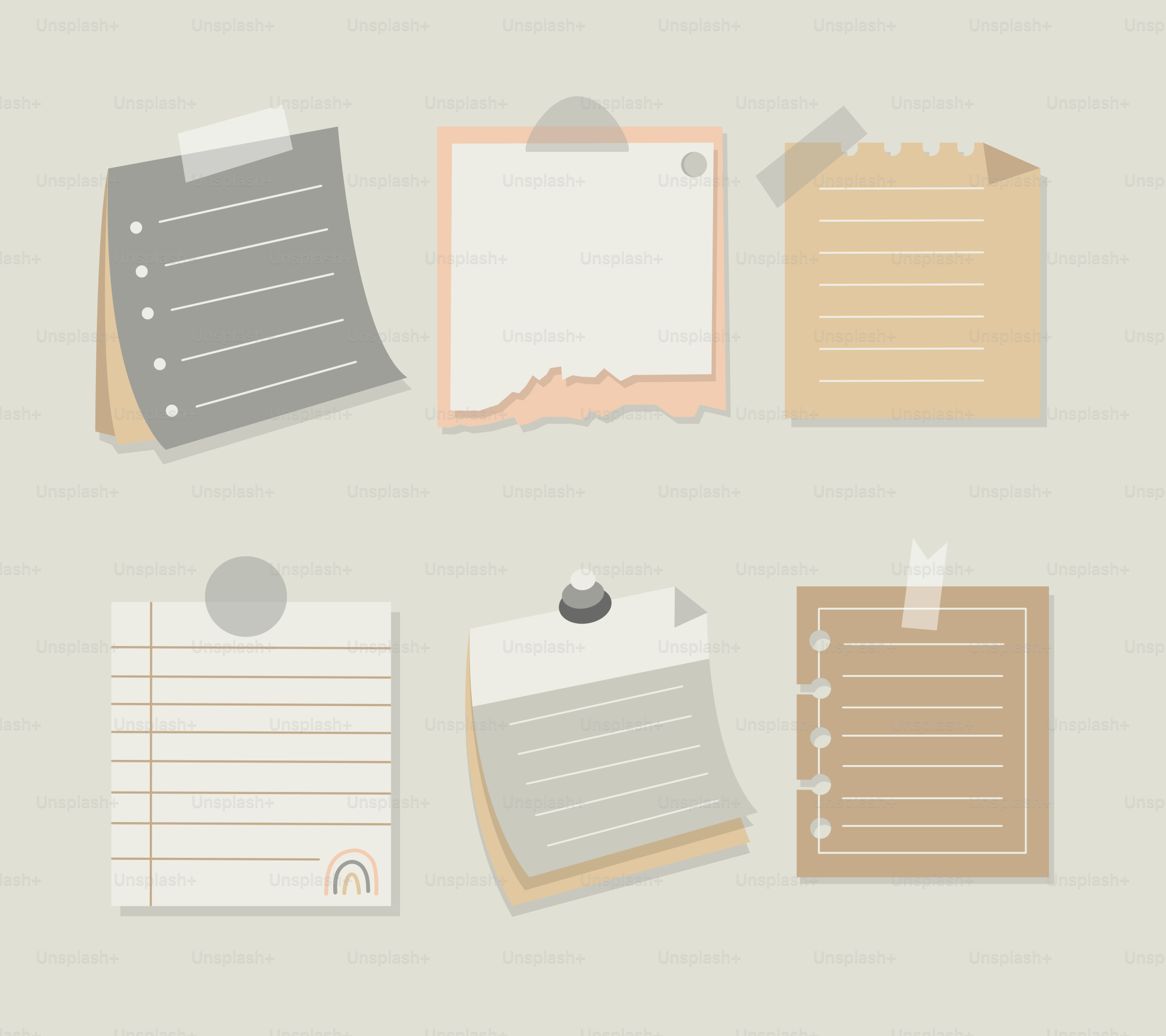 Eine Sammlung von Papier und Notizblöcken auf grauem Hintergrund