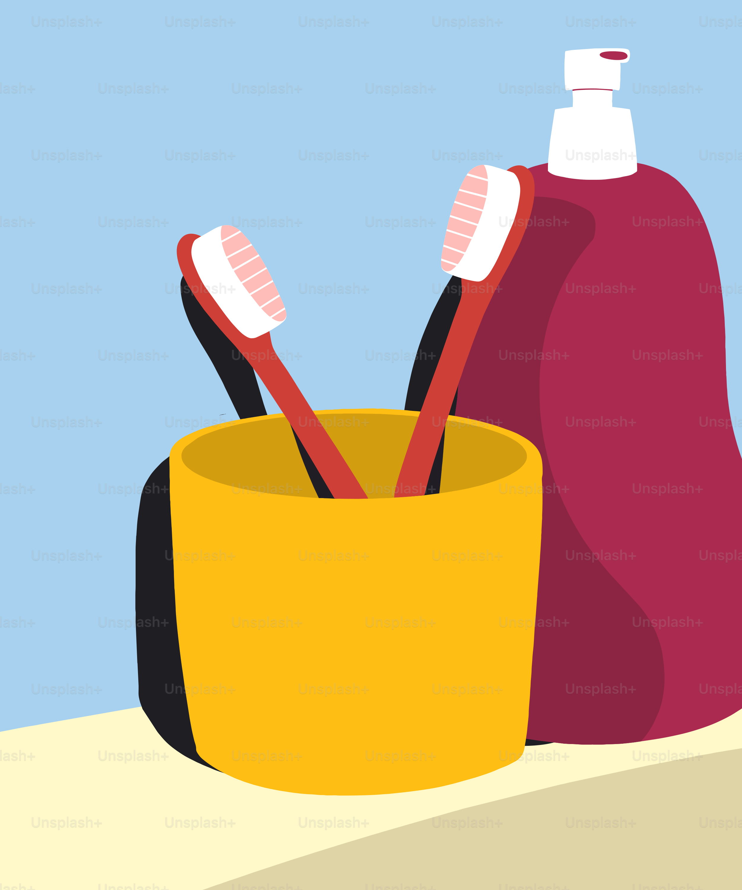 Two toothbrushes and a cup on a table