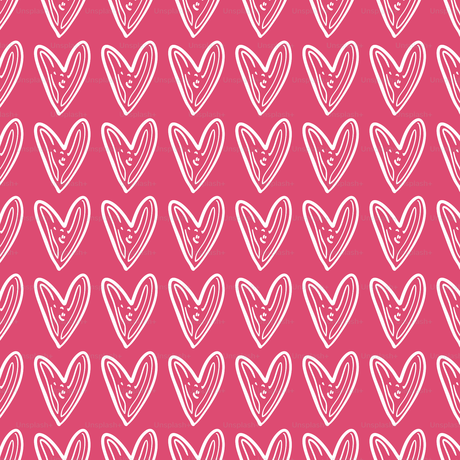 A pink background with white hearts on it
