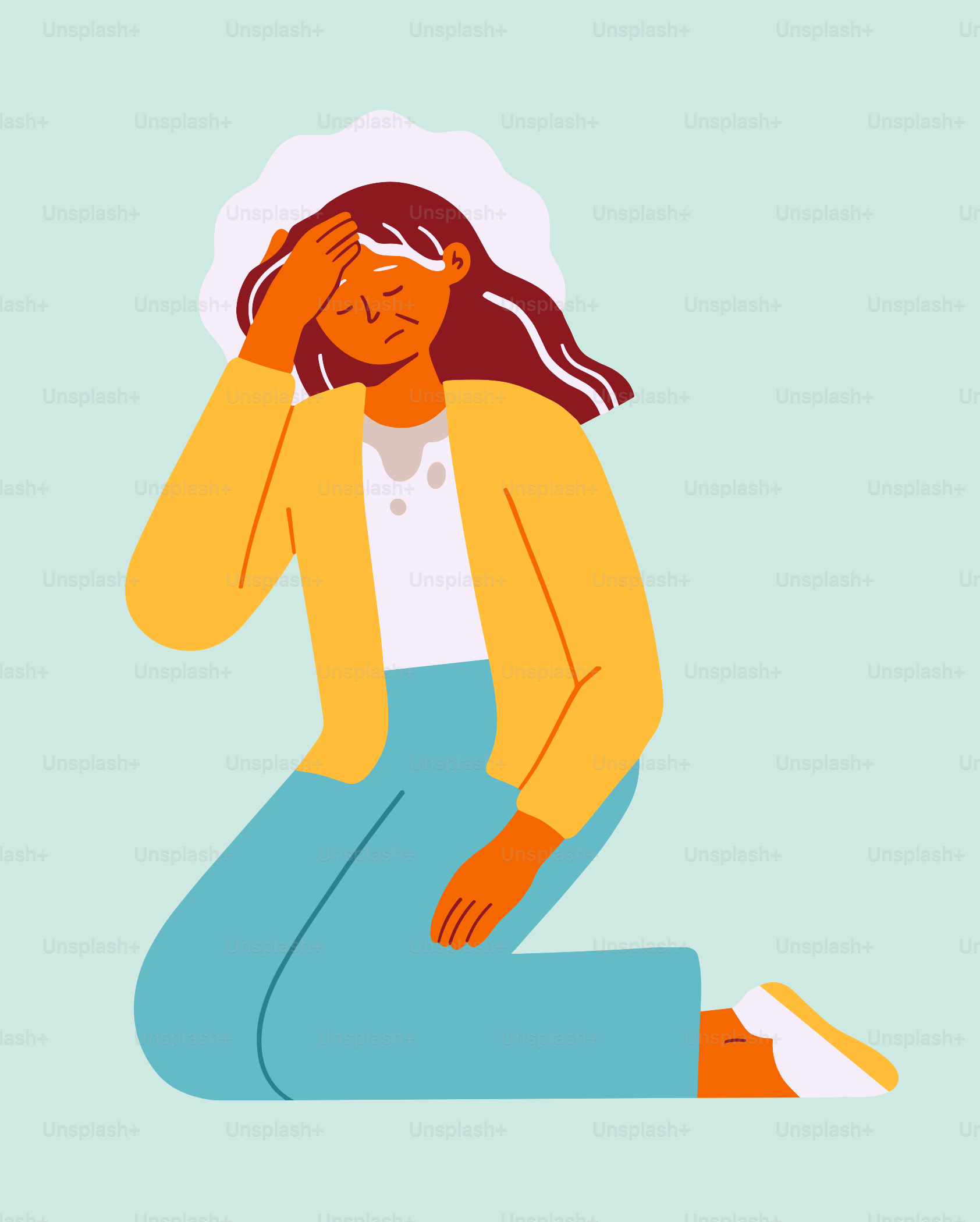 Une femme assise par terre, la tête dans les mains