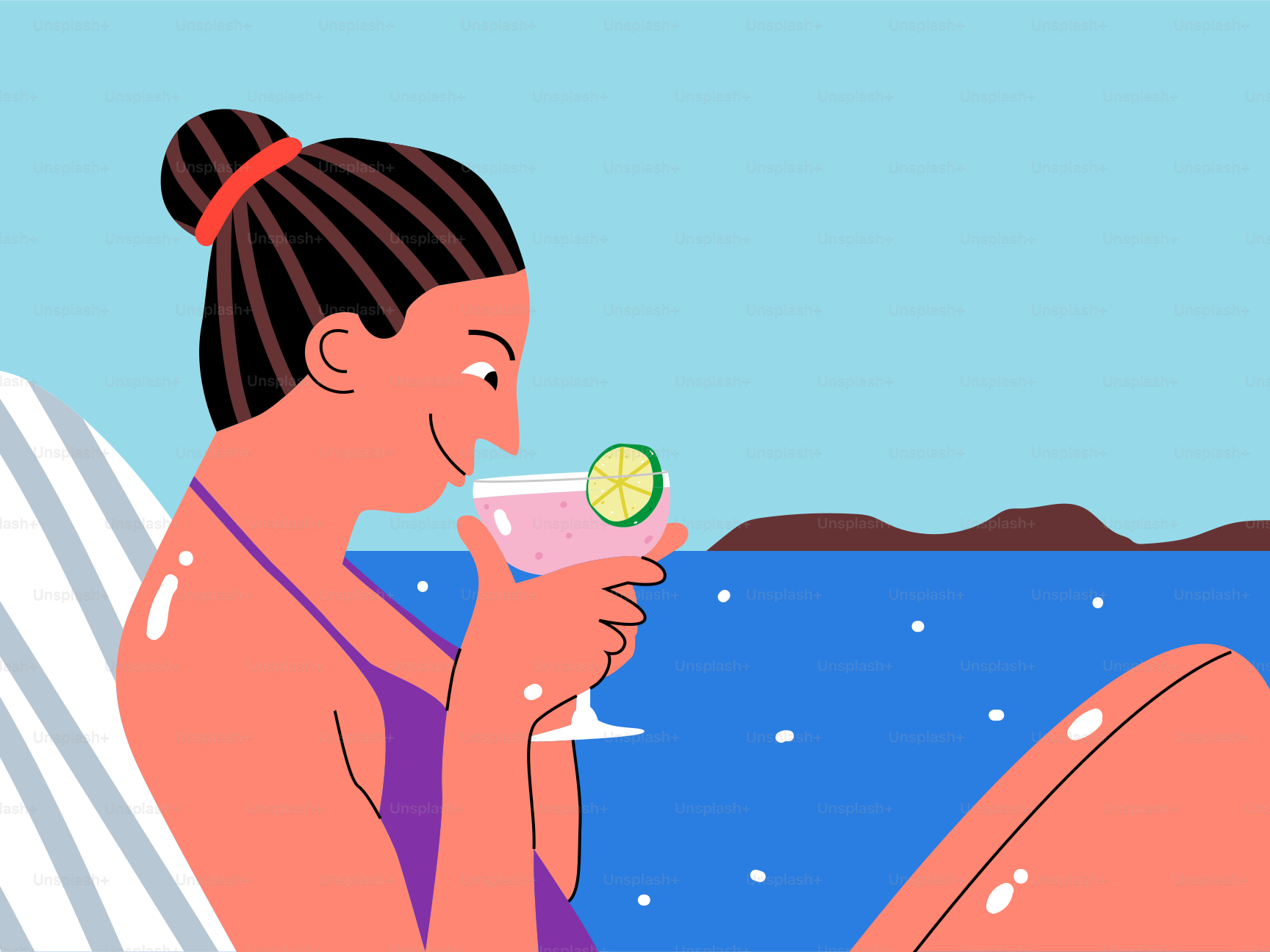 A woman sitting on a beach holding a drink