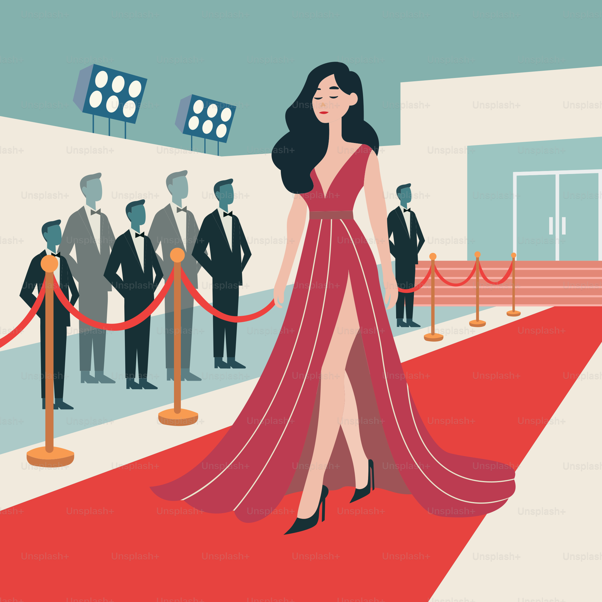 A woman in a red dress standing on a red carpet