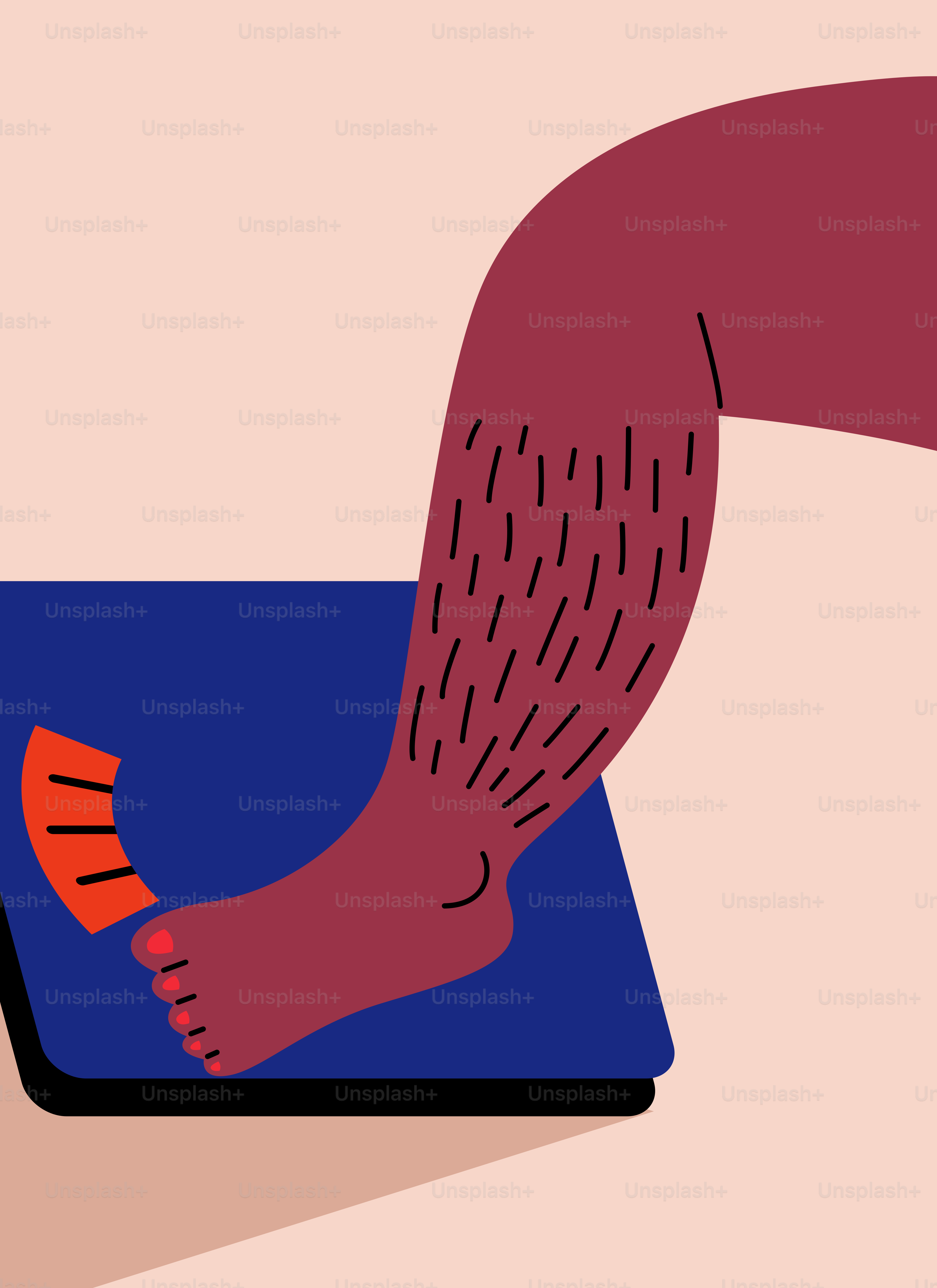 A person's foot on top of a laptop computer