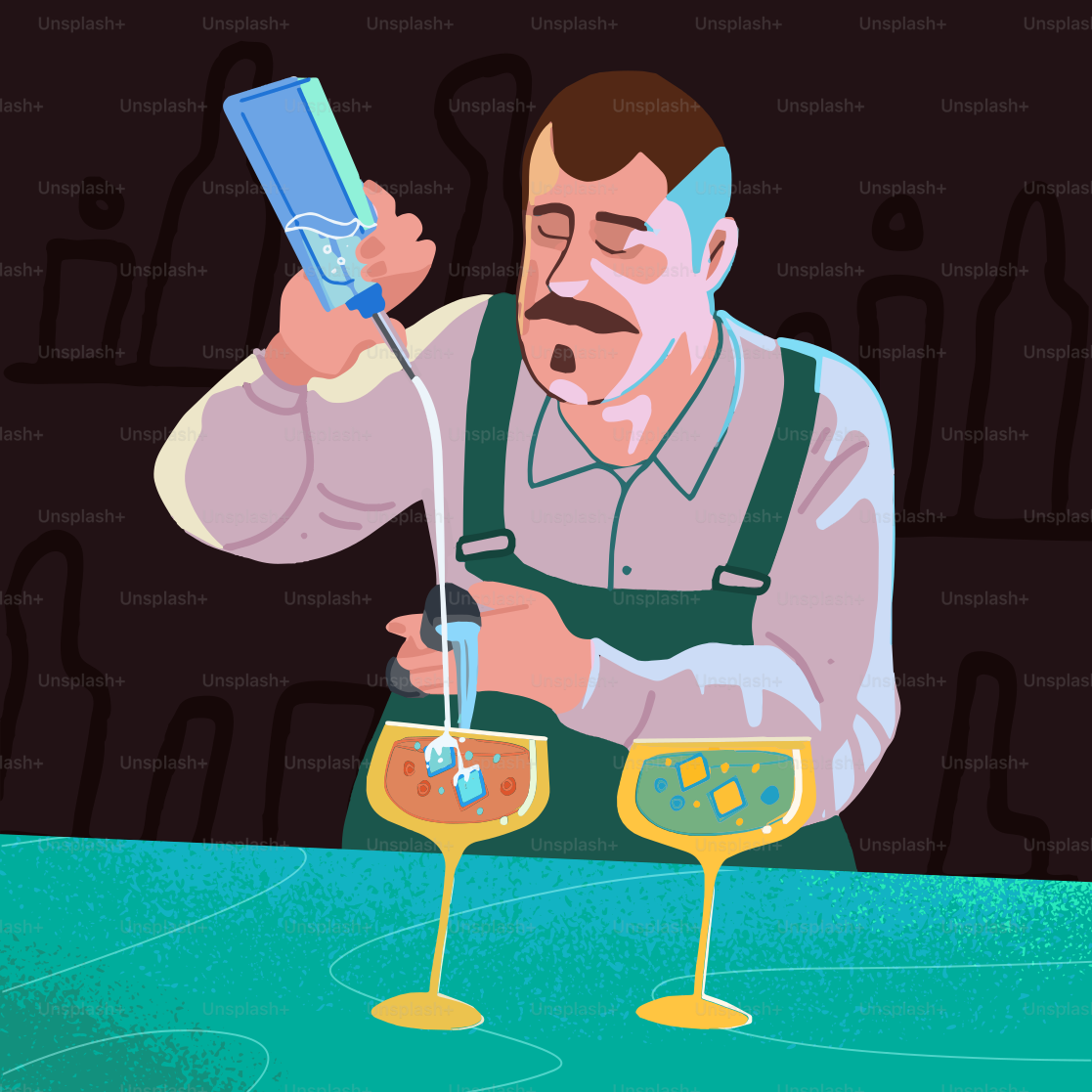 A man holding a cell phone while sitting at a table