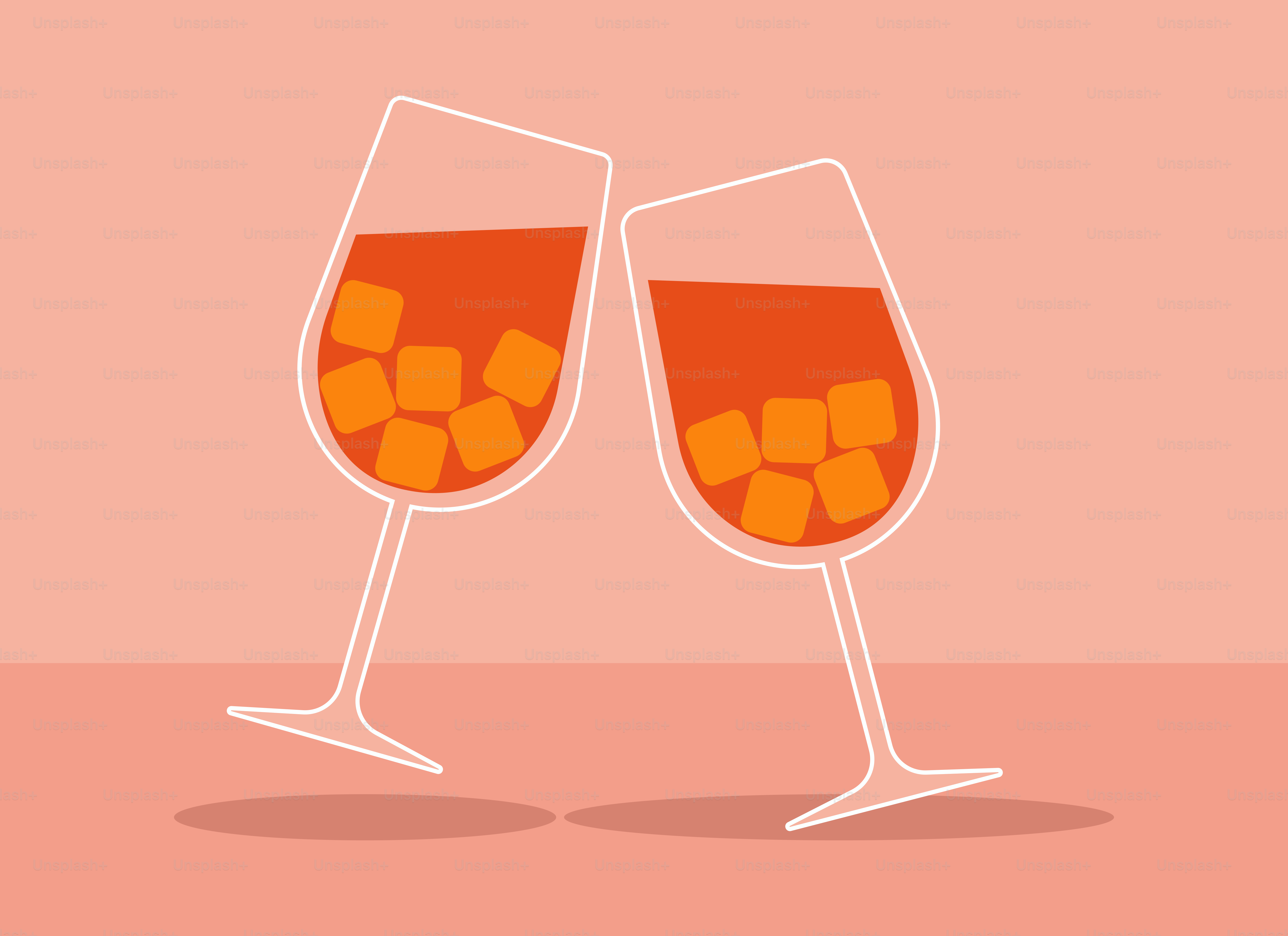 A couple of glasses of wine sitting on top of a table