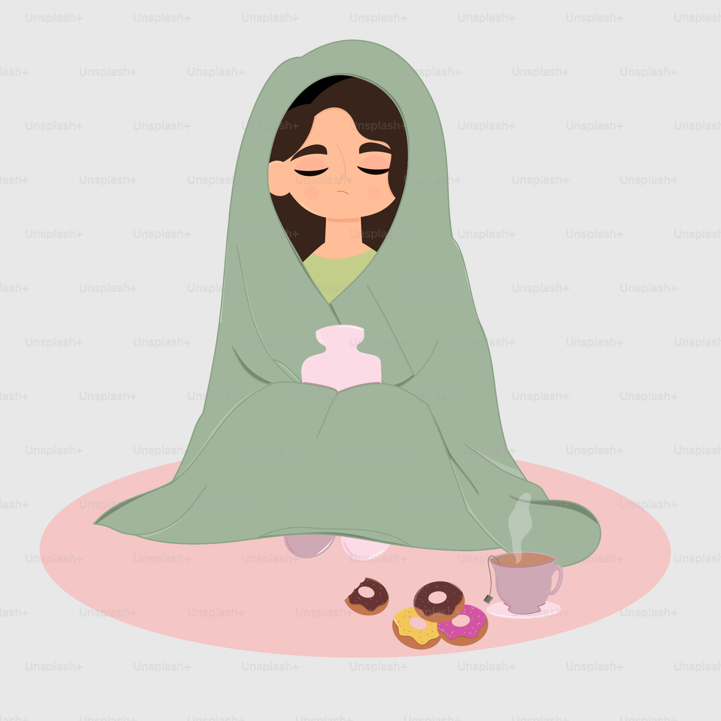 Una donna avvolta in una coperta seduta sul pavimento