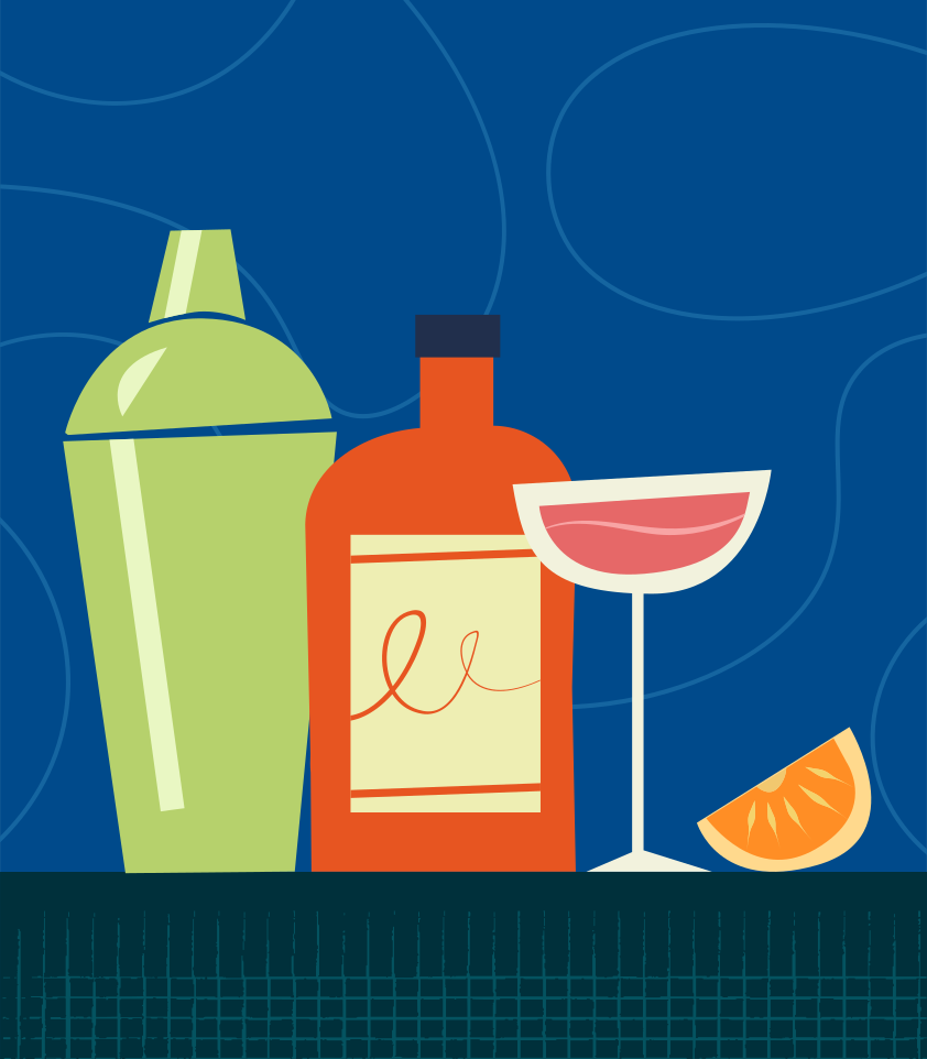 Una botella de vino y una copa de vino