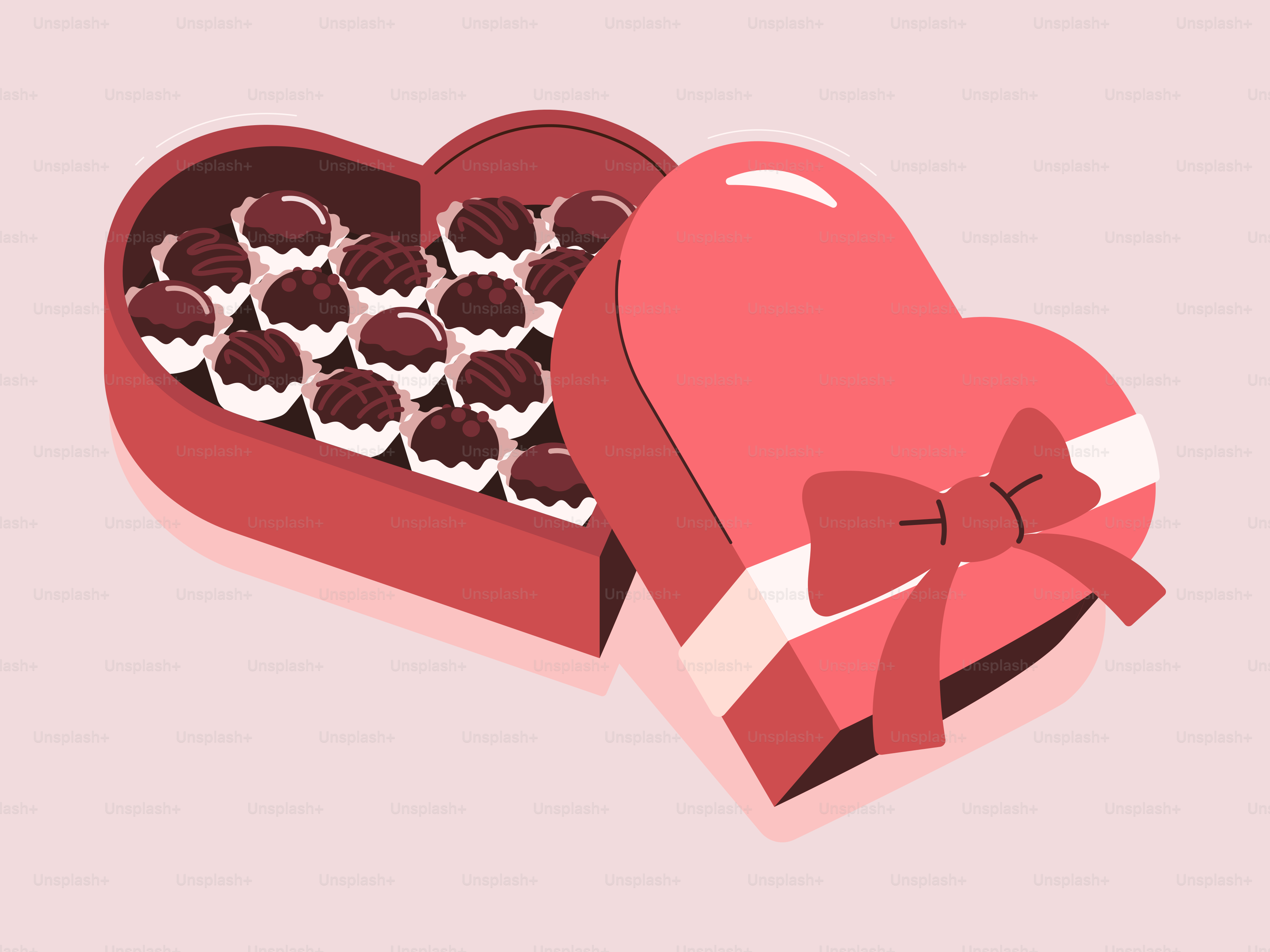 A heart shaped box of chocolates with a bow