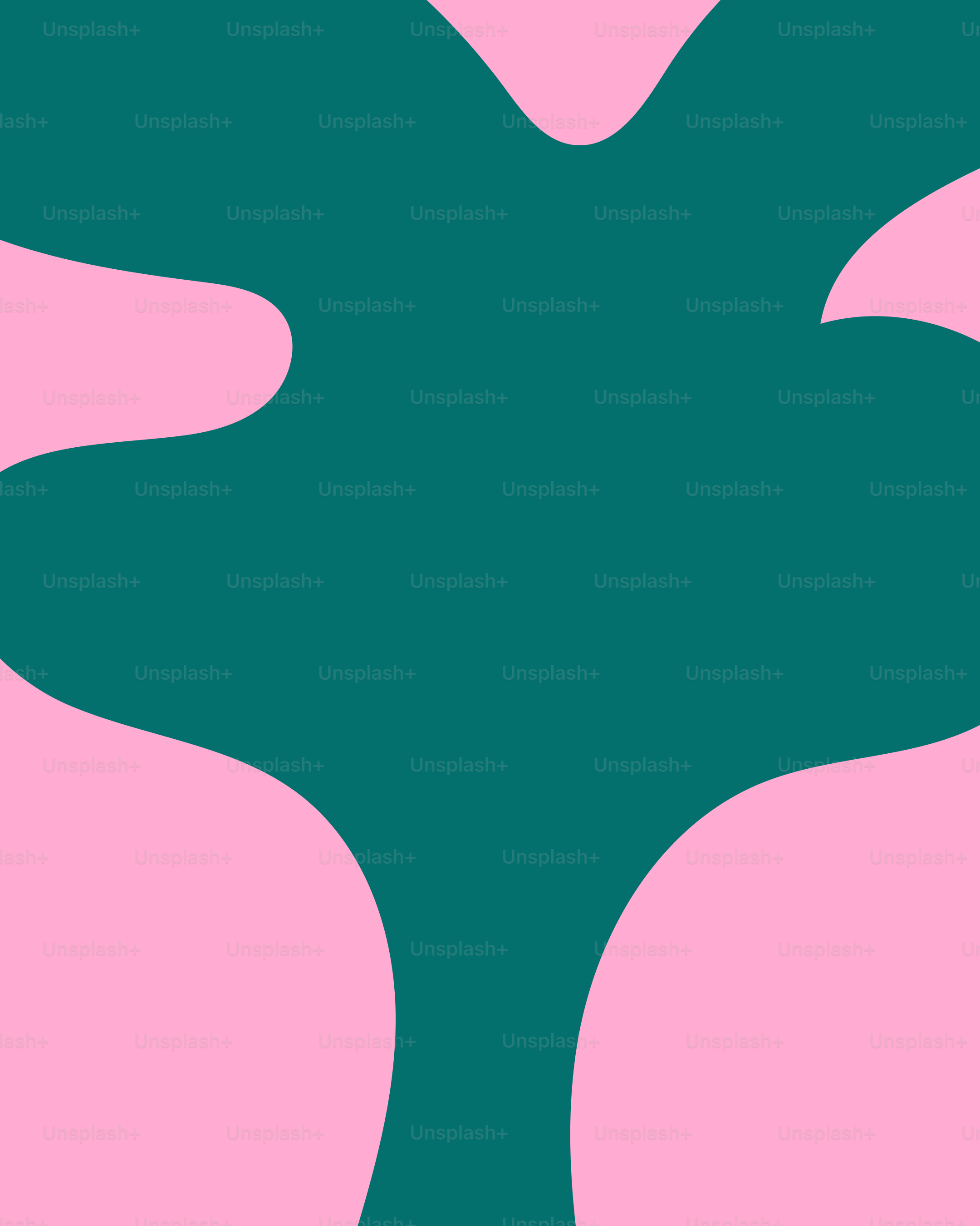 Un sapin vert et rose sur fond rose