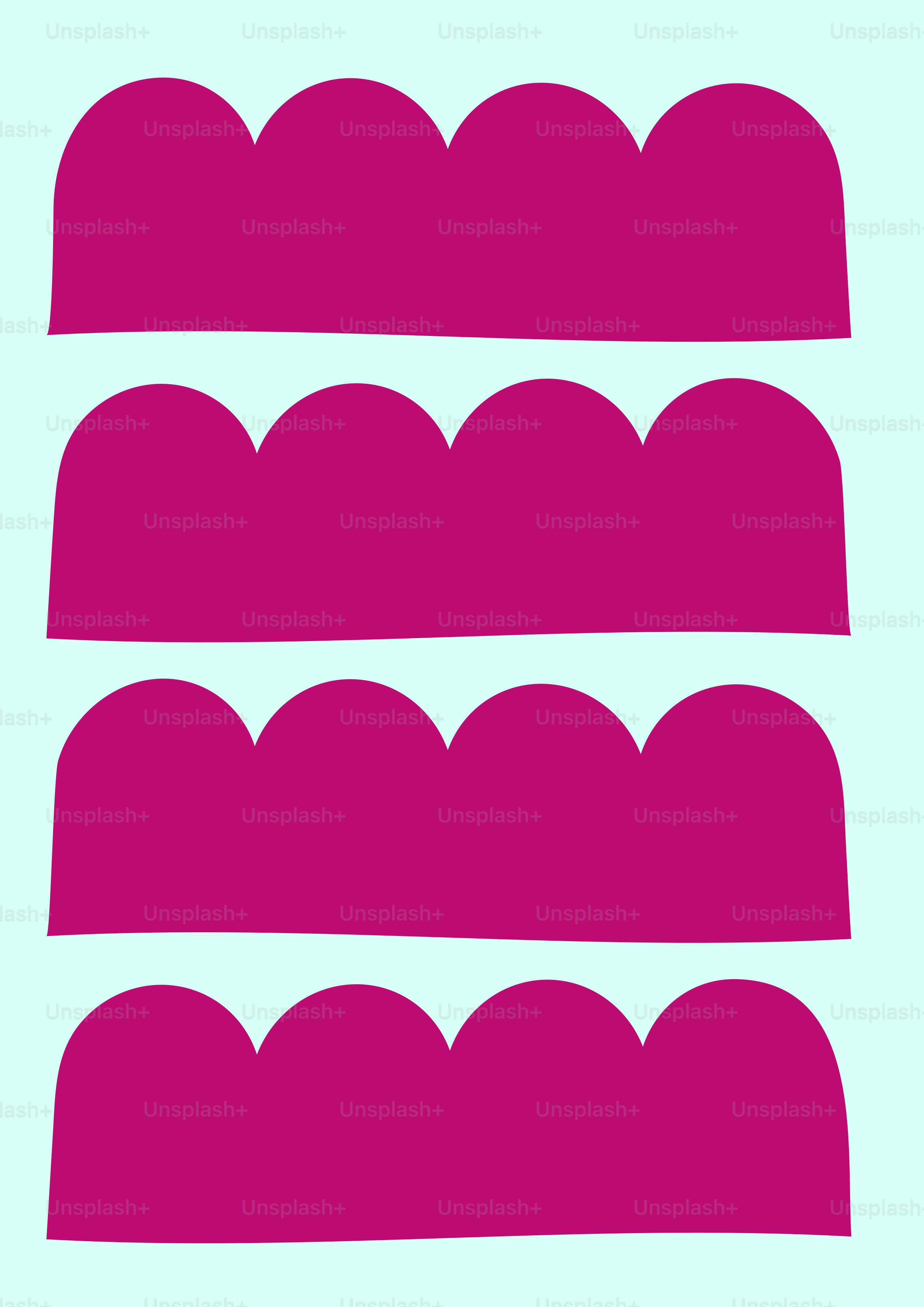 A set of pink scalloped shapes on a light blue background