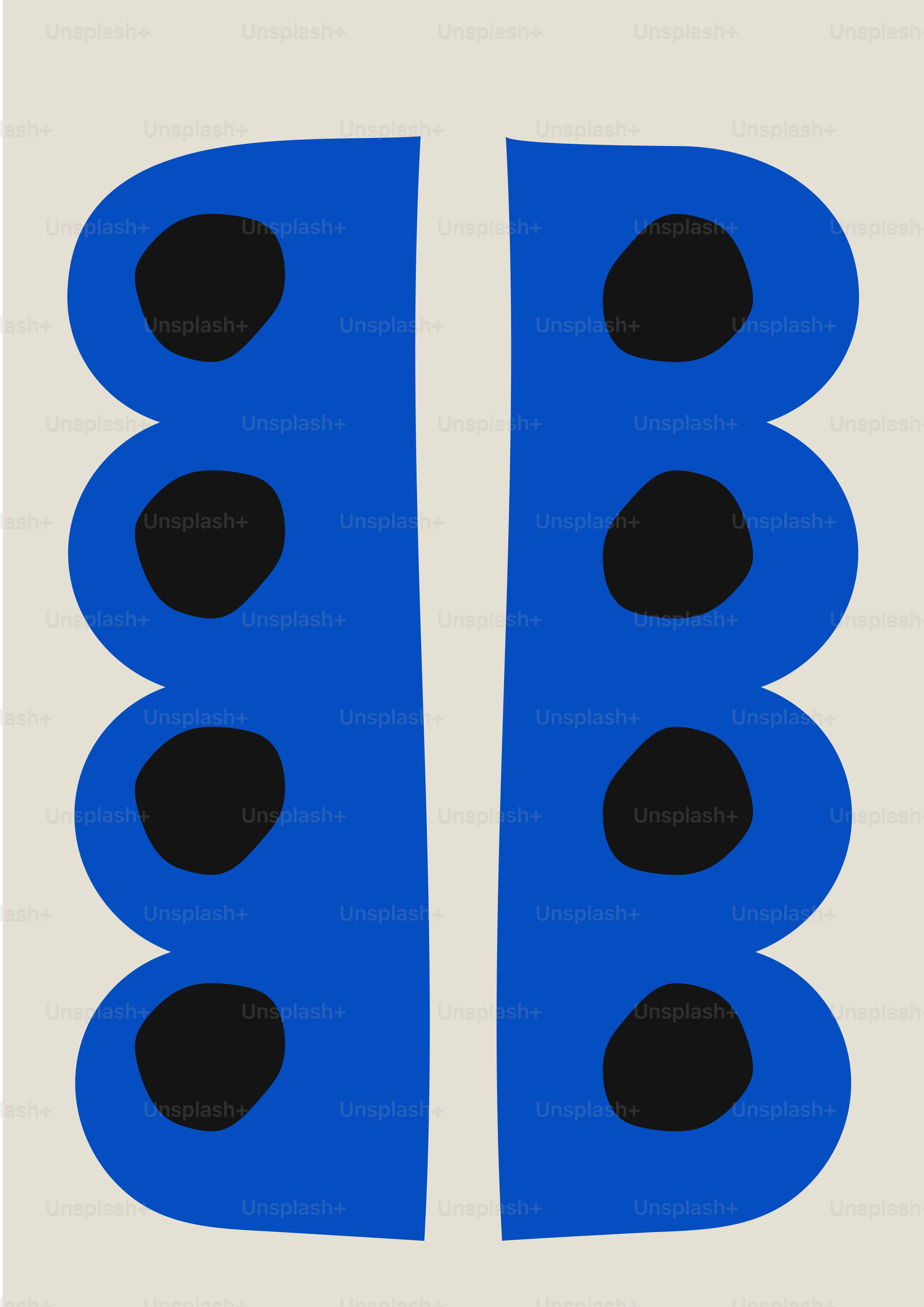 A pair of blue shoes with black dots on them