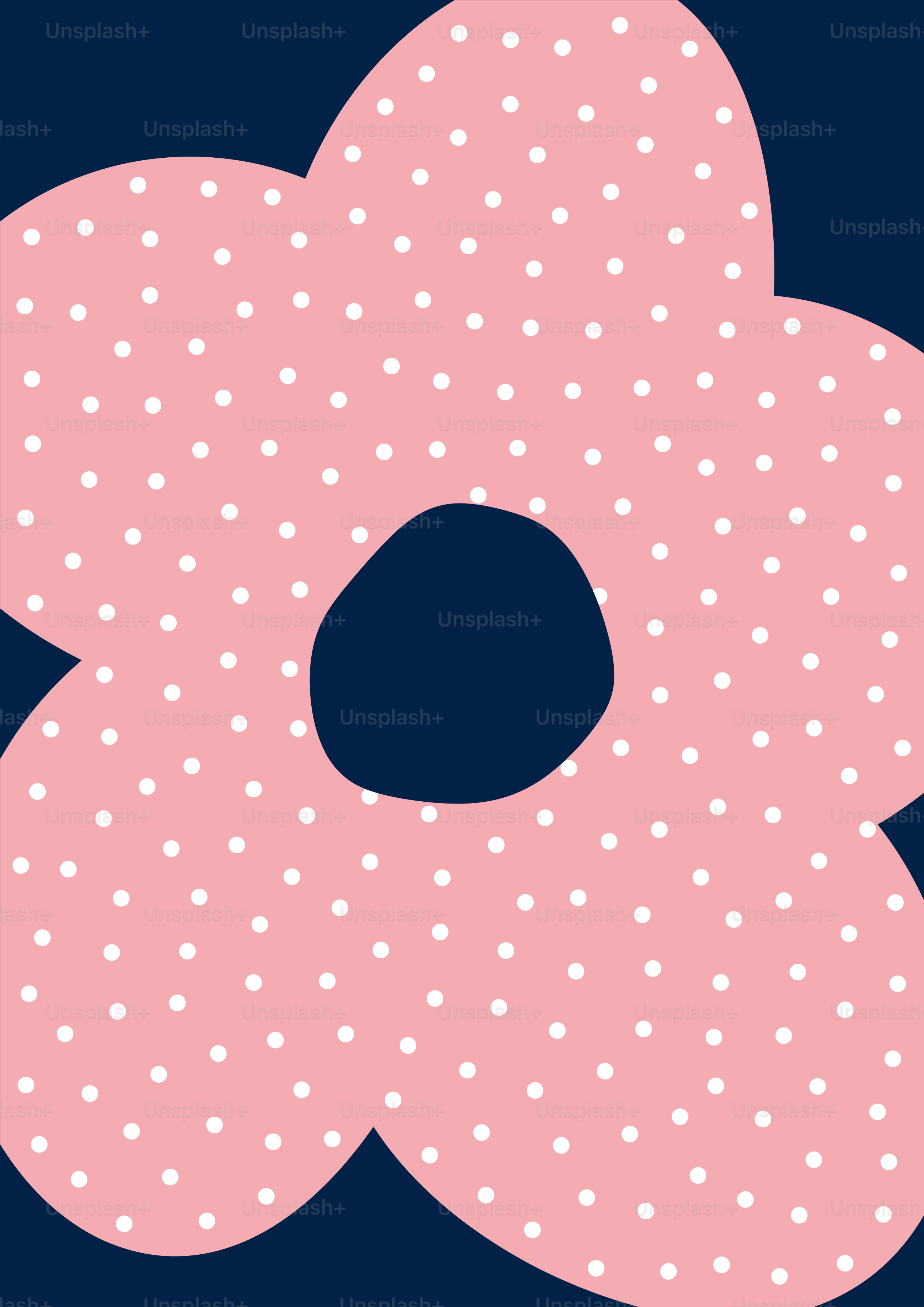 A pink flower with white dots on a blue background